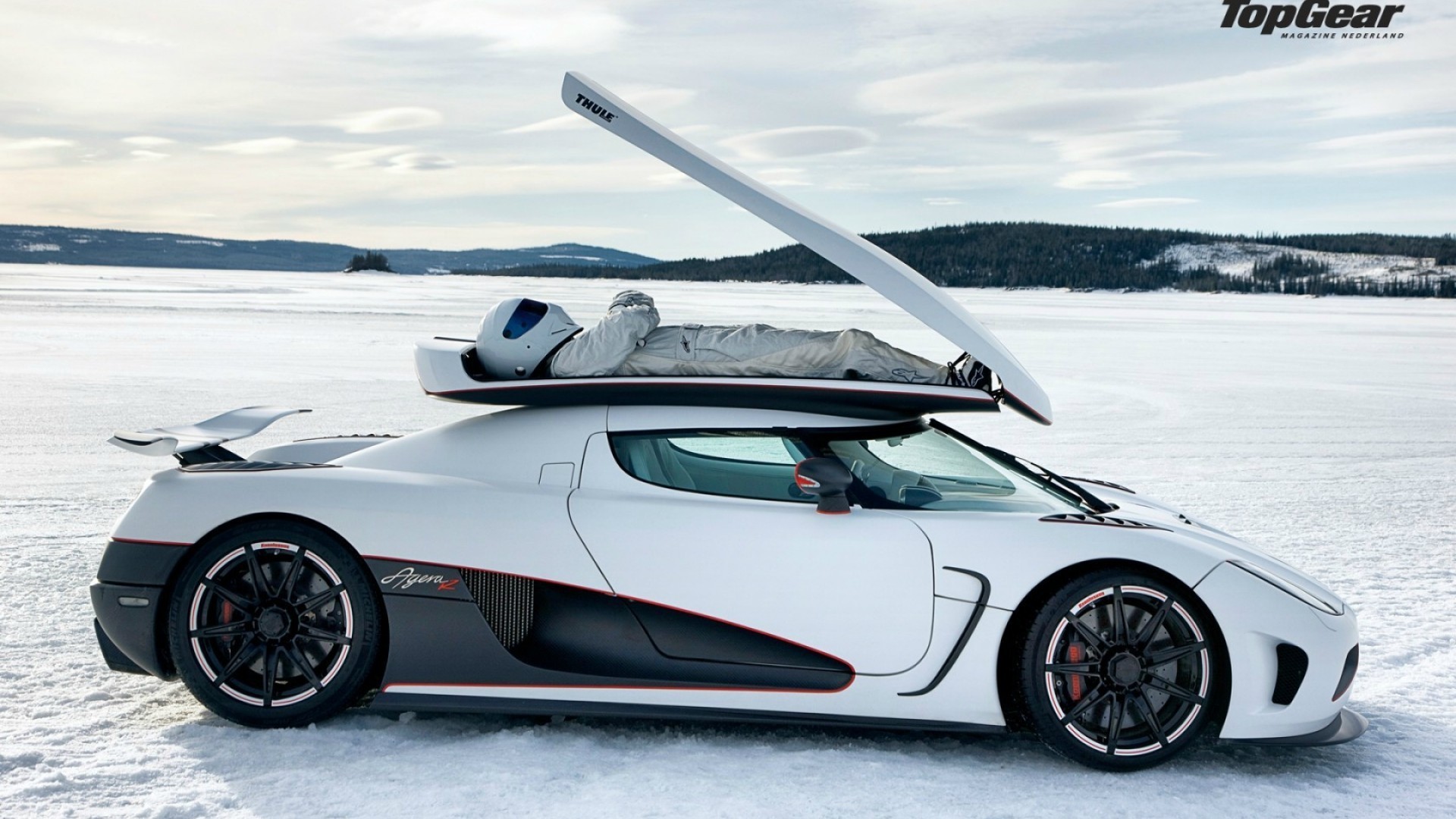General 1920x1080 car snow vehicle Koenigsegg supercars Koenigsegg Agera The Stig white cars Swedish cars side view Top Gear Hypercar clouds lying down lying on back helmet arms crossed