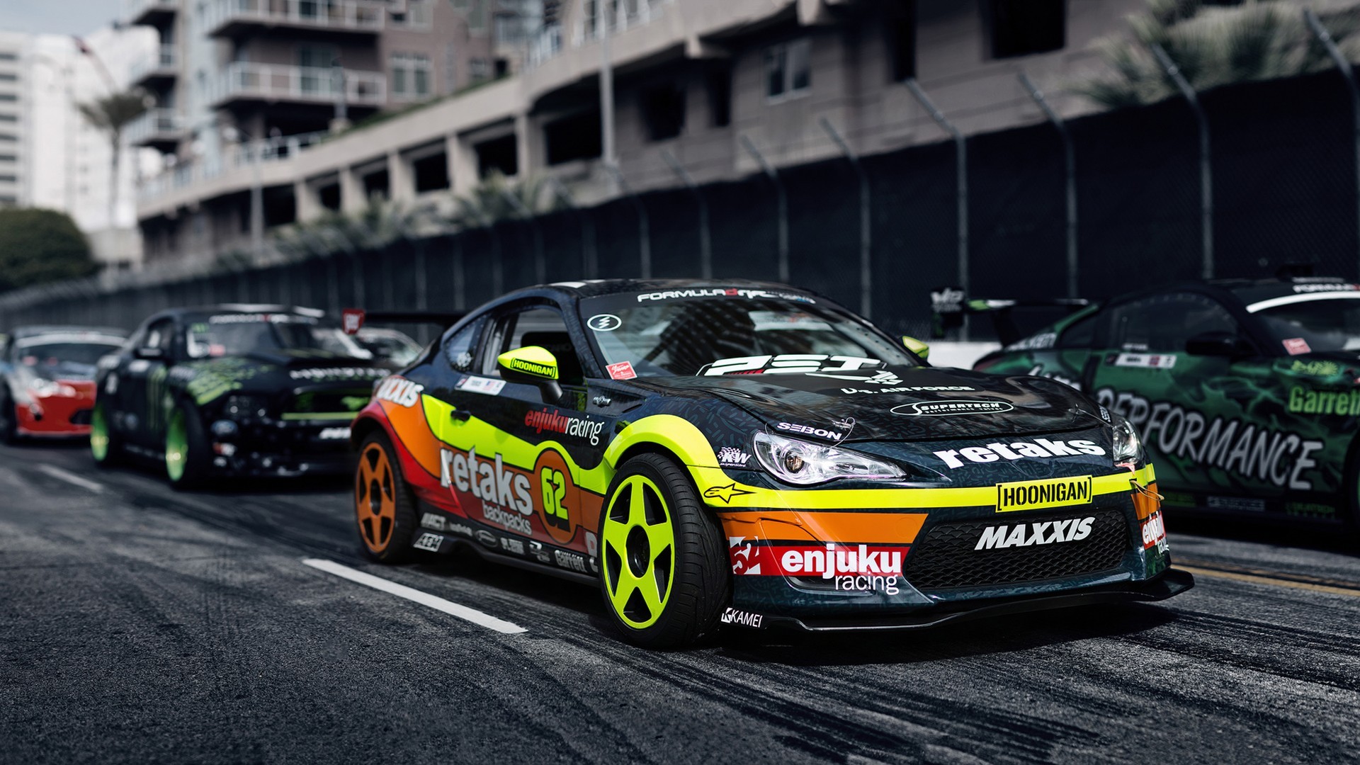 General 1920x1080 drift racing race cars car vehicle Toyota Toyobaru frontal view colored wheels motorsport livery Japanese cars