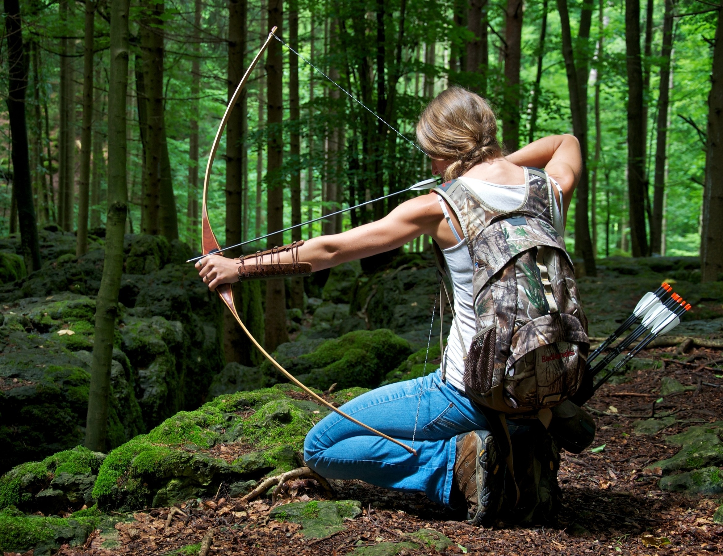 People 2342x1800 bow women hunting aiming women outdoors forest trees kneeling weapon arrows outdoors archer archery bow and arrow