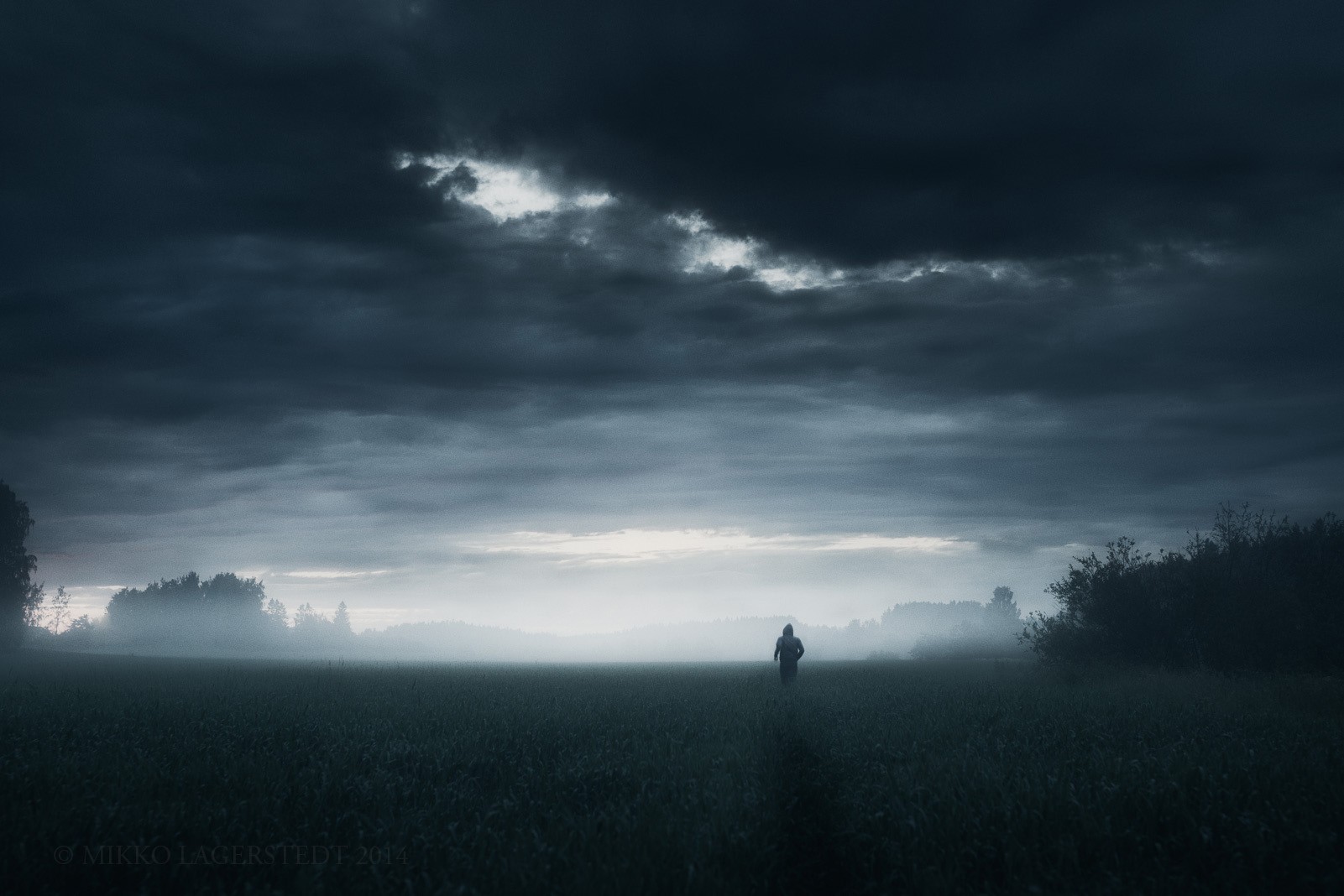 General 1601x1068 dark loneliness alone nature grass horizon rain sky clouds running people landscape solice gloomy Finland