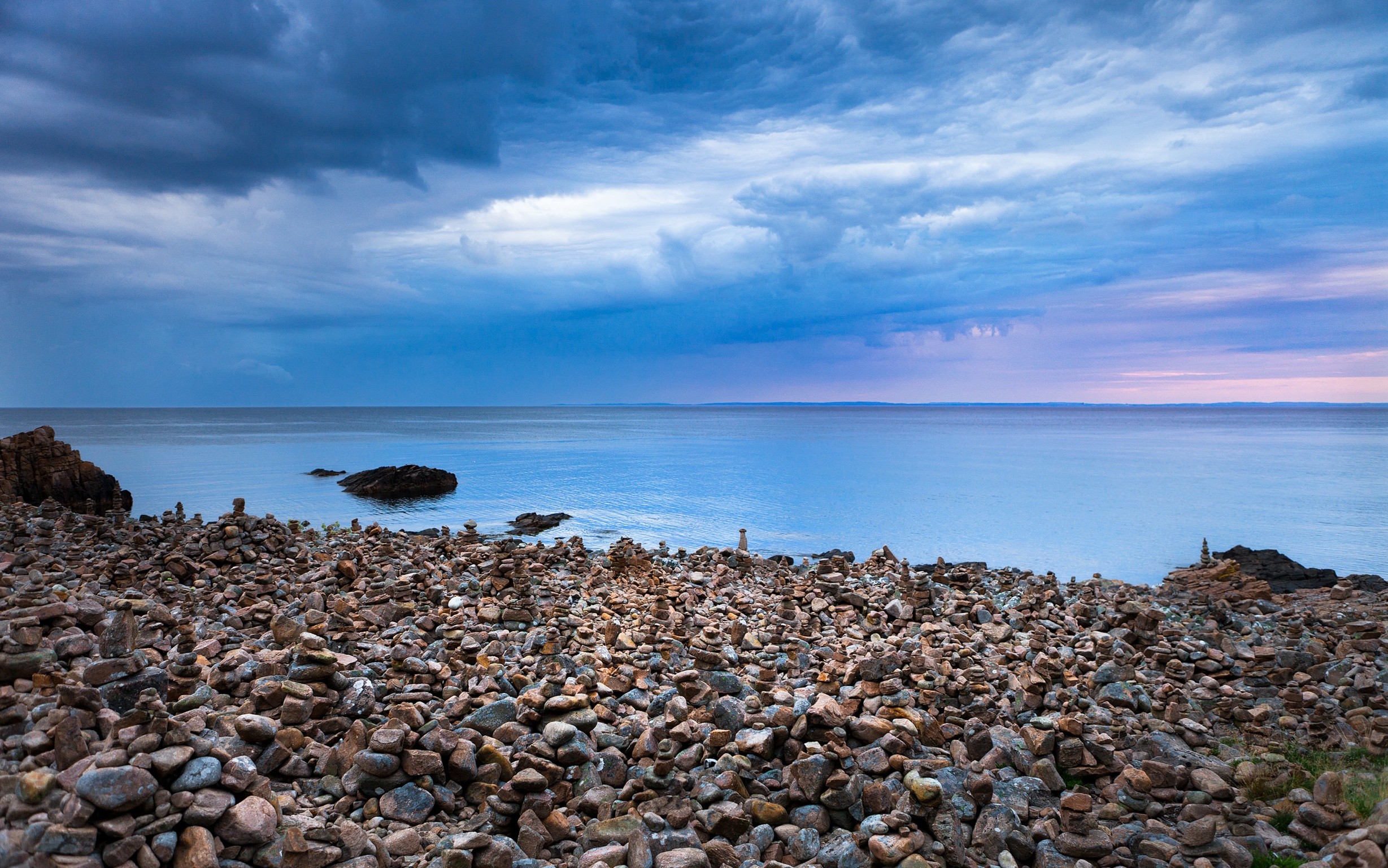 General 2457x1536 rocks Sweden beach landscape sea clouds