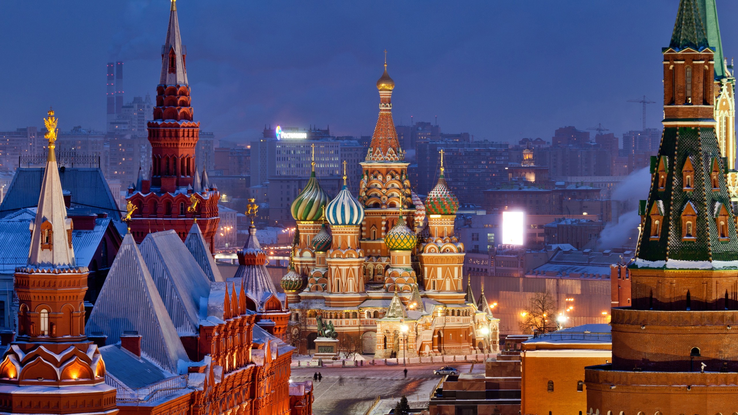General 2560x1440 Moscow Russia Europe church Kremlin city cityscape architecture aerial view building rooftops capital snow winter evening cathedral Red Square lights street Saint Basil's Cathedral landmark