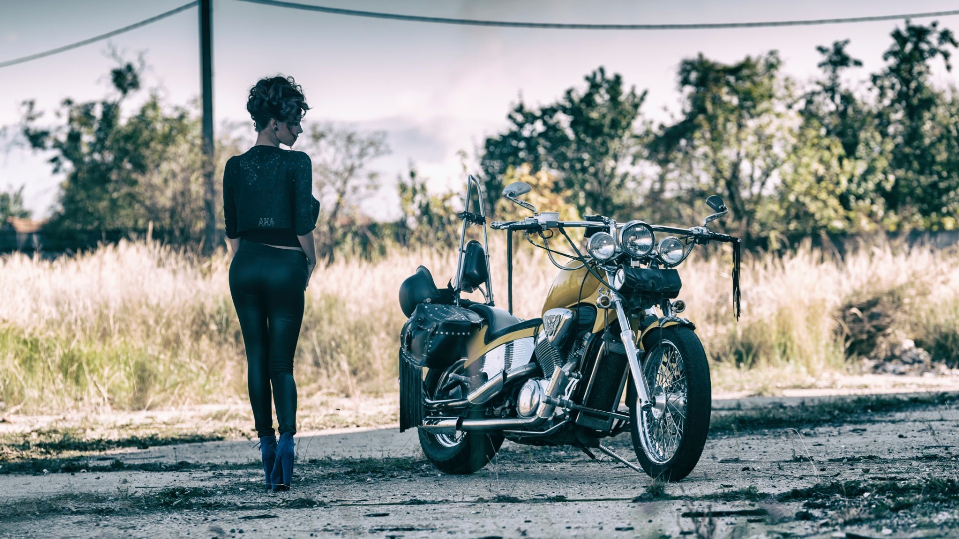 People 1920x1080 chopper women with motorcycles vehicle Harley-Davidson women model women outdoors standing black hair ass heels leggings