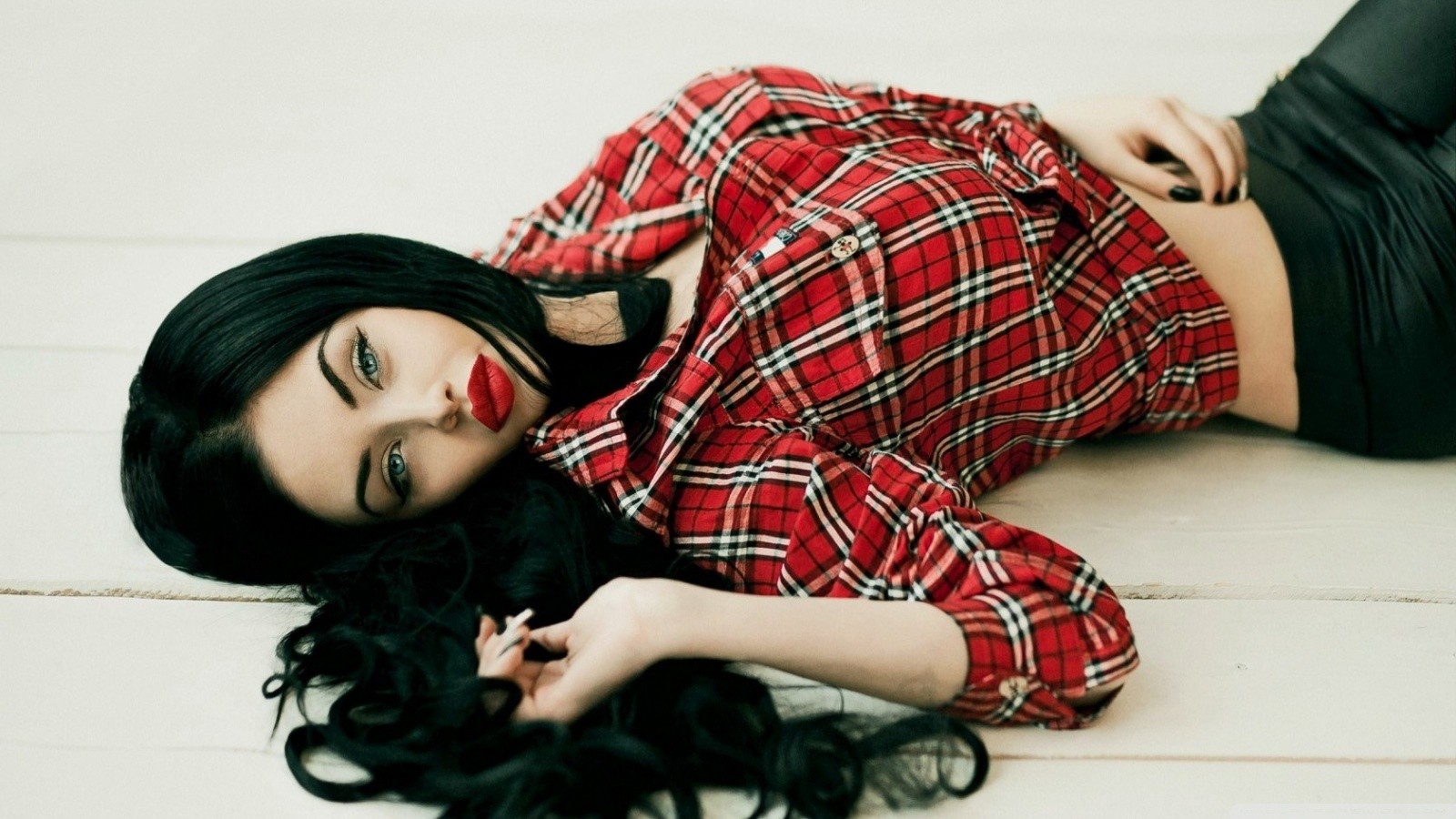 People 1600x900 dark hair women red lipstick painted nails makeup lying on back long hair black nails plaid skirt