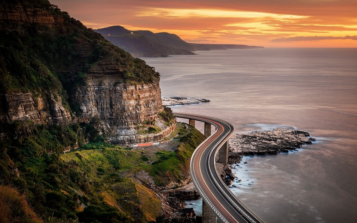 General 1230x768 nature landscape sunset sea coast highway cliff clouds mountains shrubs road