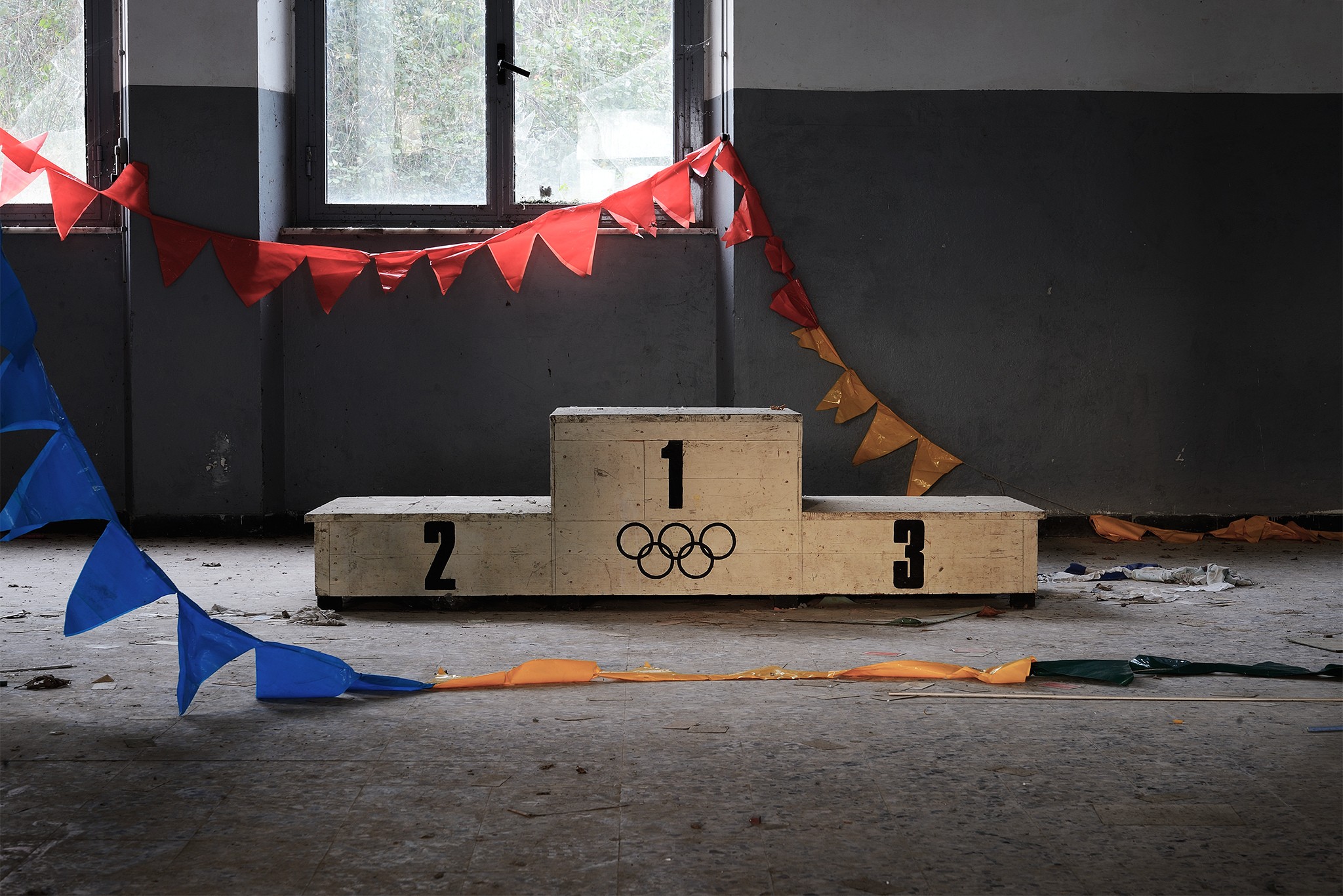 General 2048x1367 abandoned interior podiums Olympics flag window wall stages on the floor numbers