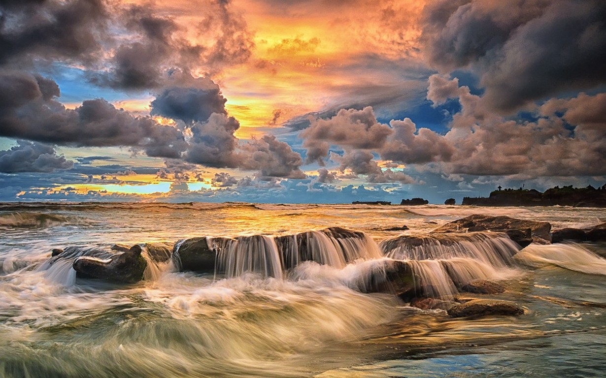 General 1230x768 nature landscape sunset coast beach sky clouds sea rocks Bali Indonesia tropical sunlight Asia