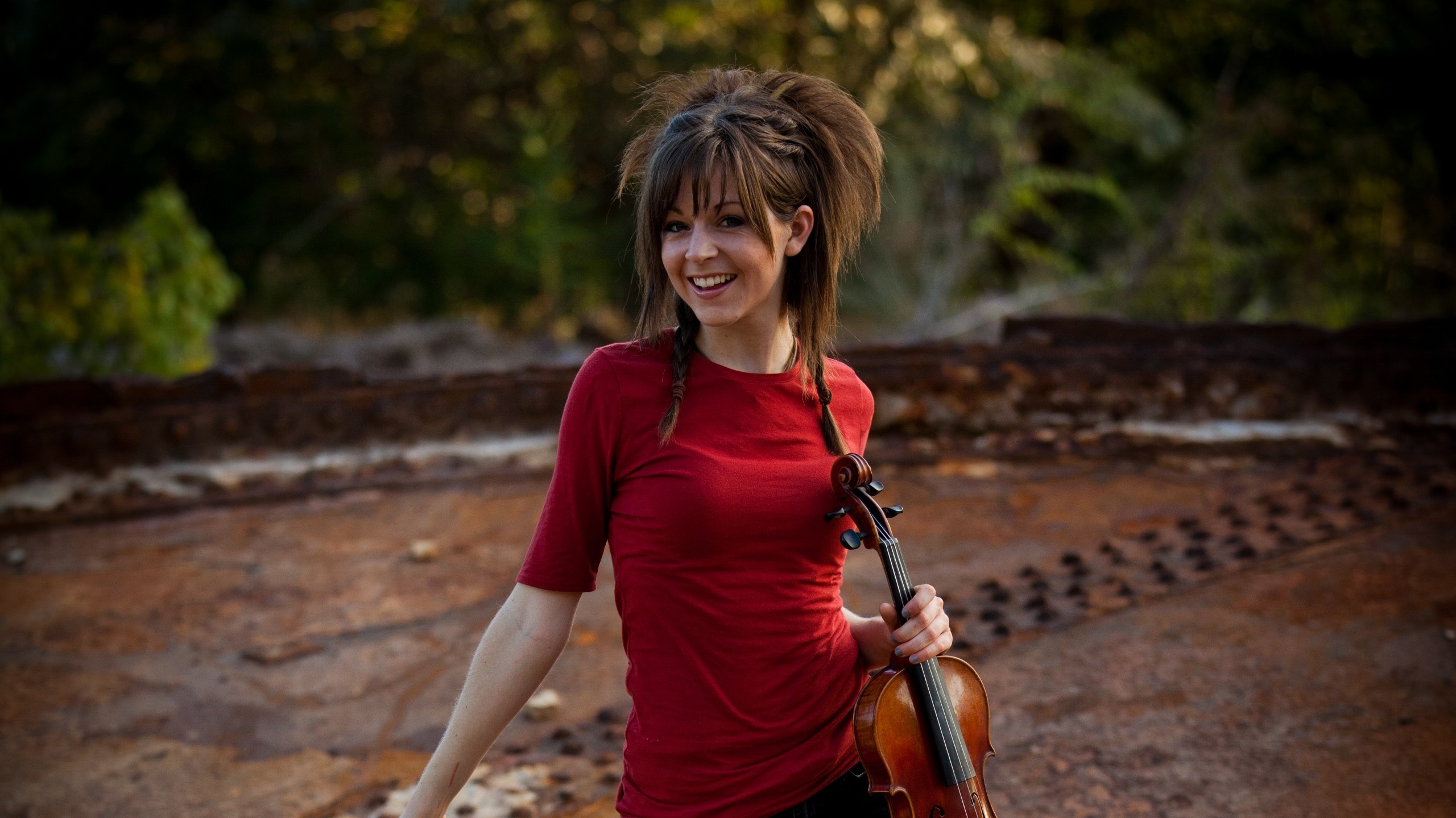 People 2560x1439 Lindsey Stirling violin women musician musical instrument smiling red clothing women outdoors