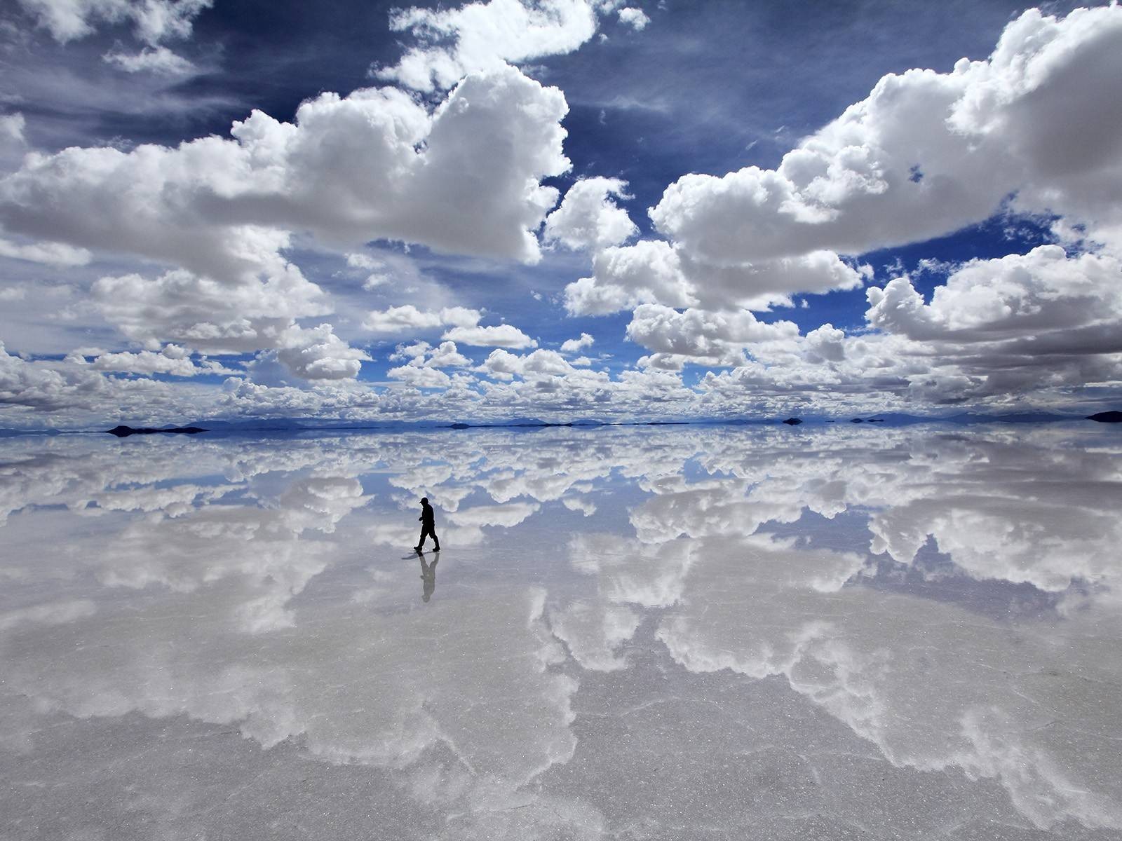 General 1600x1200 Bolivia clouds sky lake South America reflection landscape walking outdoors nature men men outdoors Salar de Uyuni