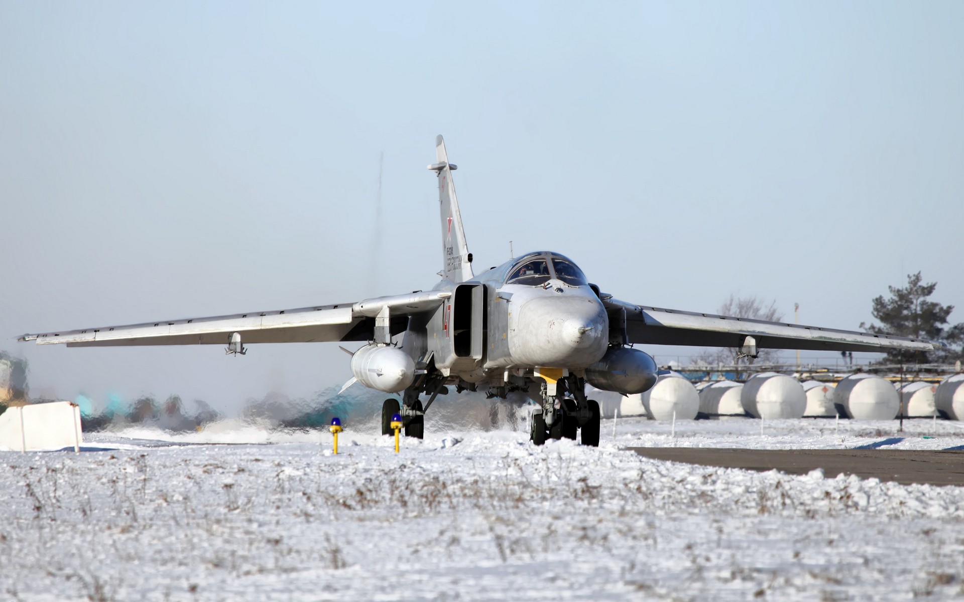General 1920x1200 aircraft military airplane Sukhoi Su-24 Russian/Soviet aircraft Sukhoi frontal view snow covered snow