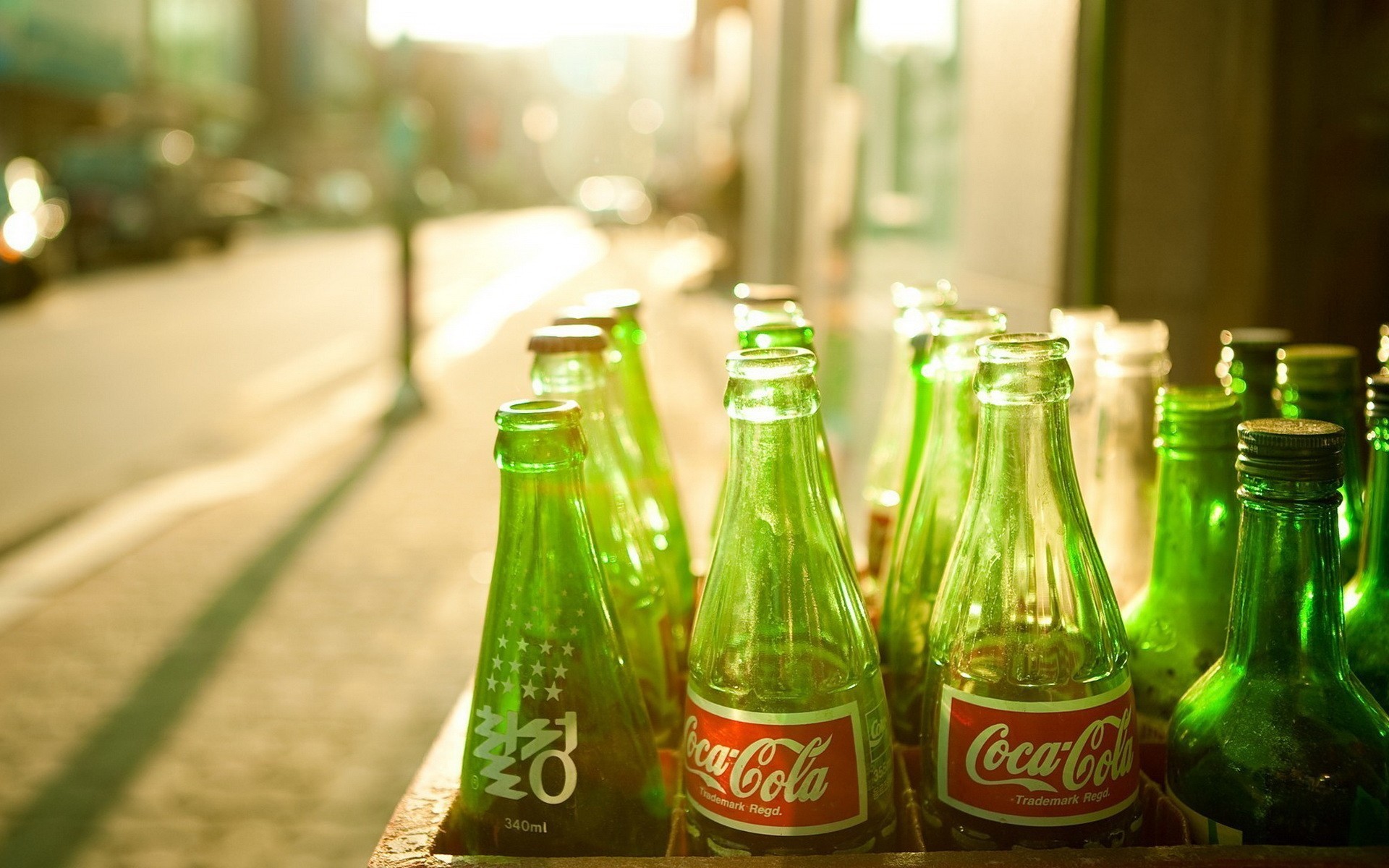 General 1920x1200 Coca-Cola bottles urban logo city outdoors green sunlight street brand