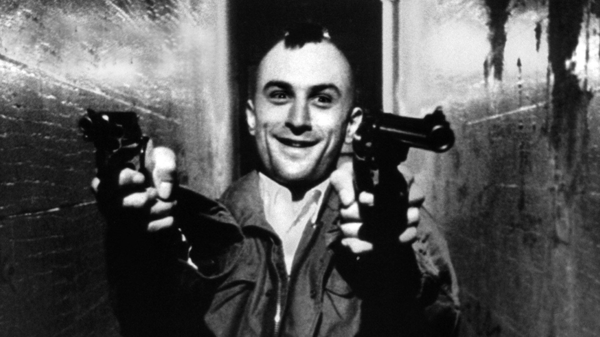 People 1920x1080 movies Robert de Niro monochrome weapon revolver Taxi Driver smiling gun scary face mohawk frontal view film stills men actor celebrity aiming dual wield