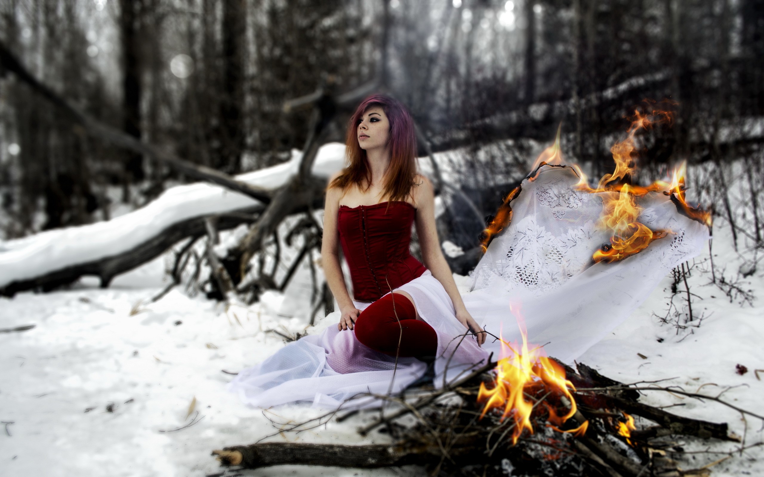 People 2560x1600 fire women outdoors women snow winter dress dyed hair forest depth of field fantasy girl cold red clothing model outdoors burning campfire