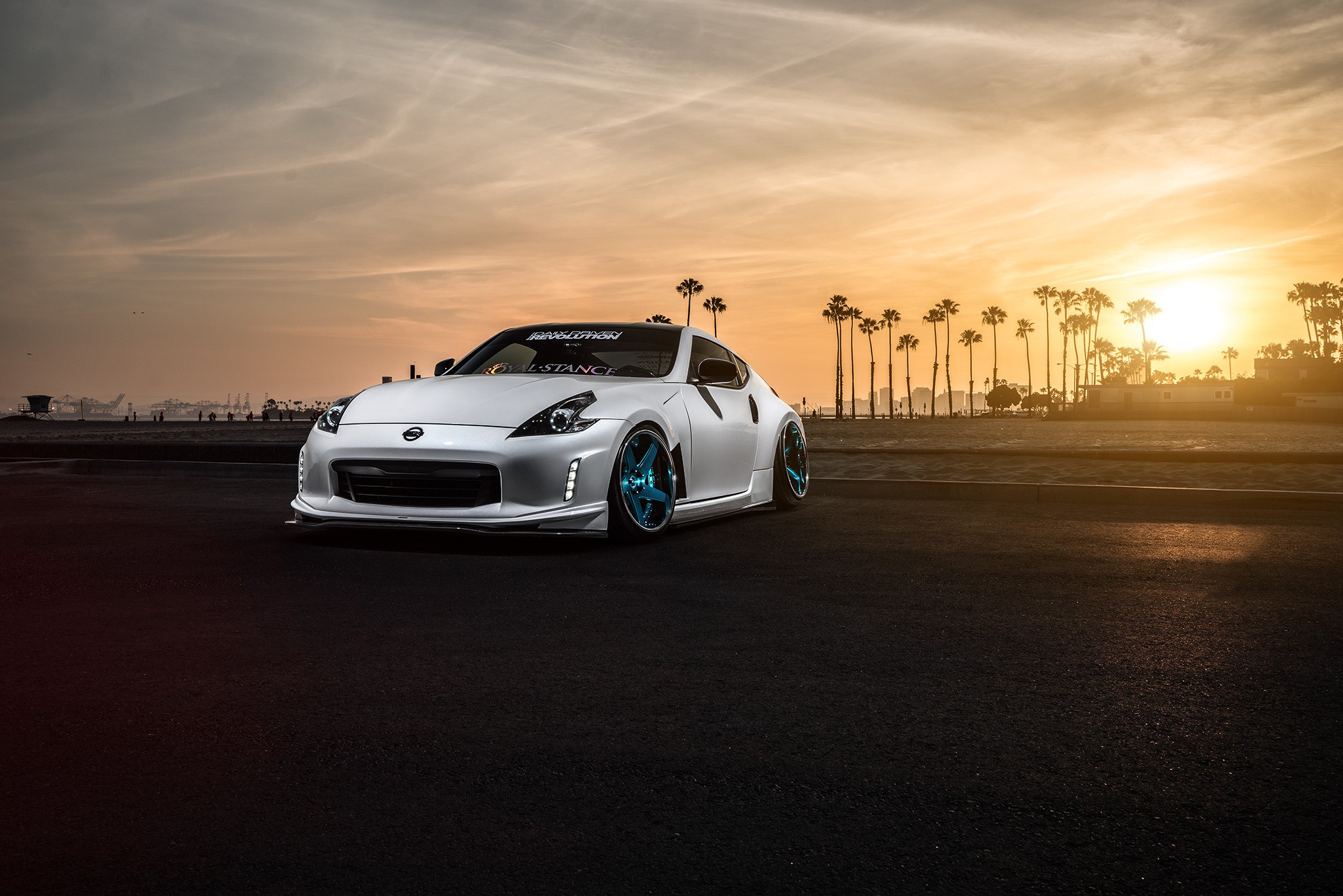 General 2048x1367 Nissan car stance (cars) sunlight palm trees tuning colored wheels negative camber stanced Nissan Fairlady Z Nissan 370Z silver cars 500px sky