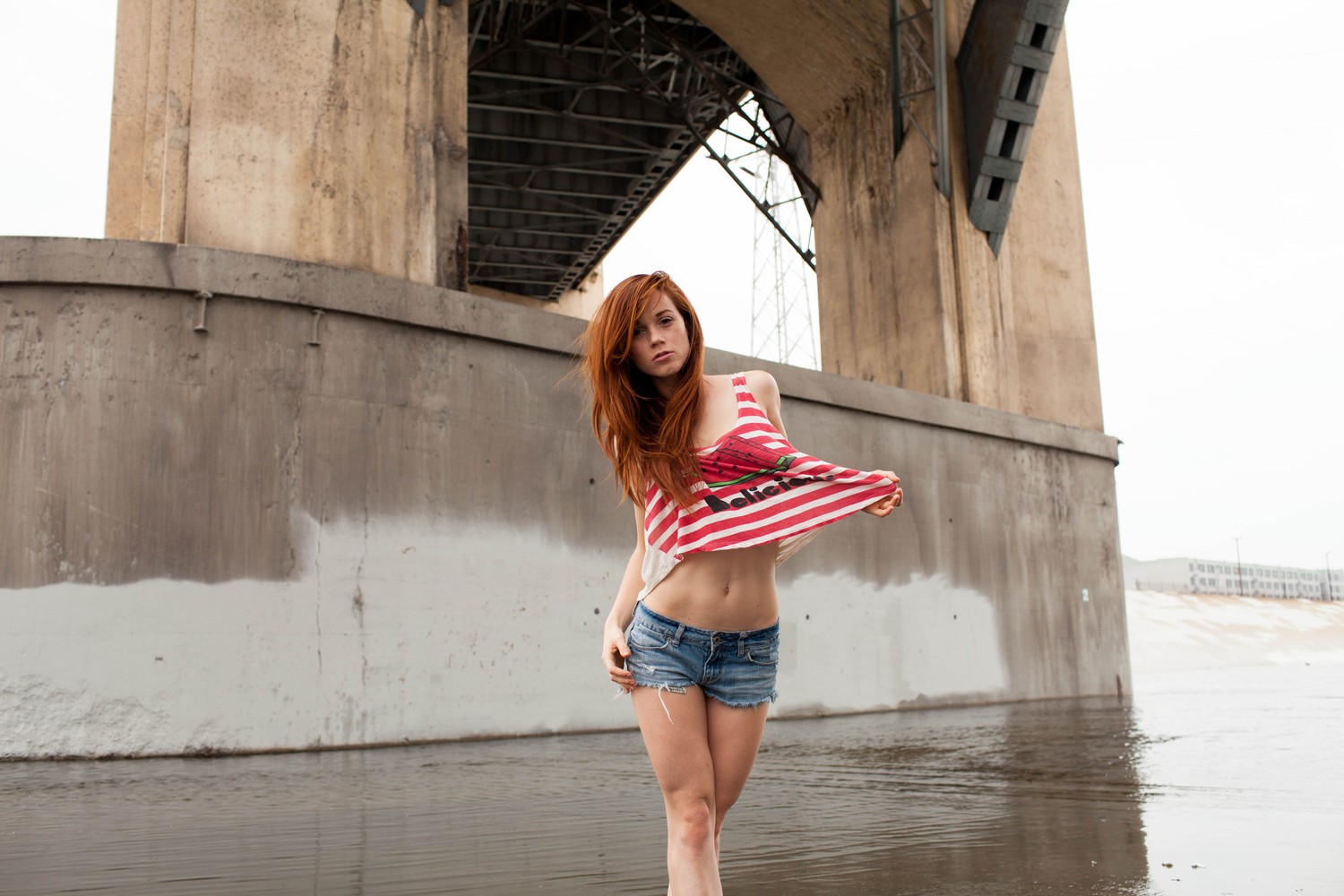 People 1500x1000 redhead face women jean shorts women outdoors belly pulling clothing long hair standing bridge outdoors model striped clothing