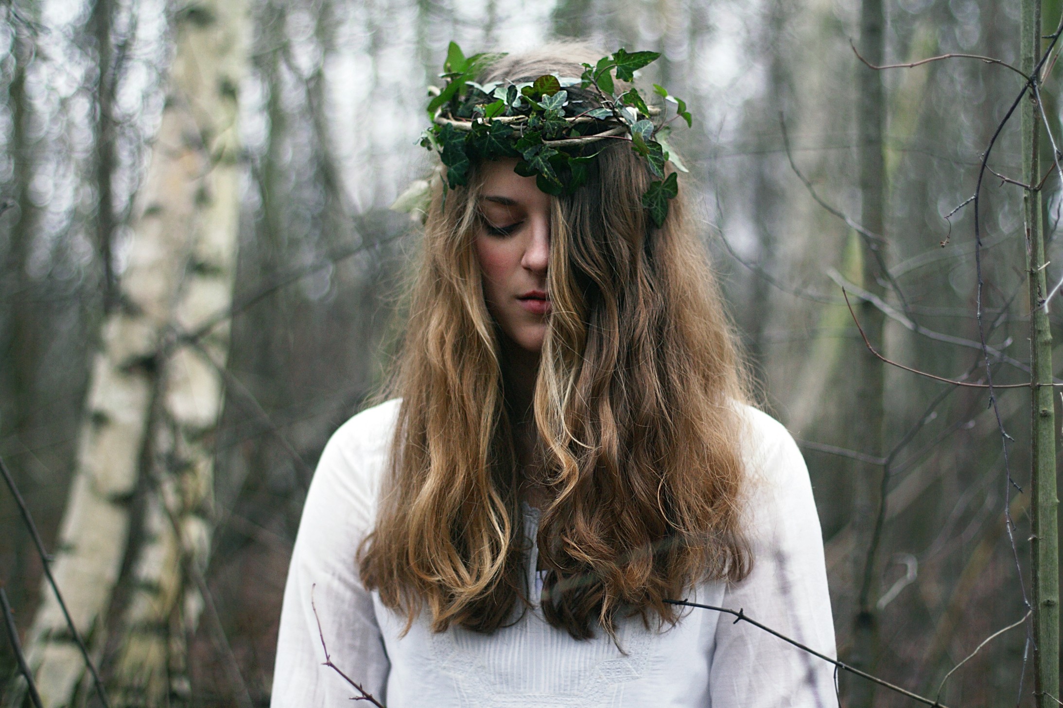 People 2187x1458 women model women outdoors plants flower crown long hair hair over one eye nature trees white clothing face