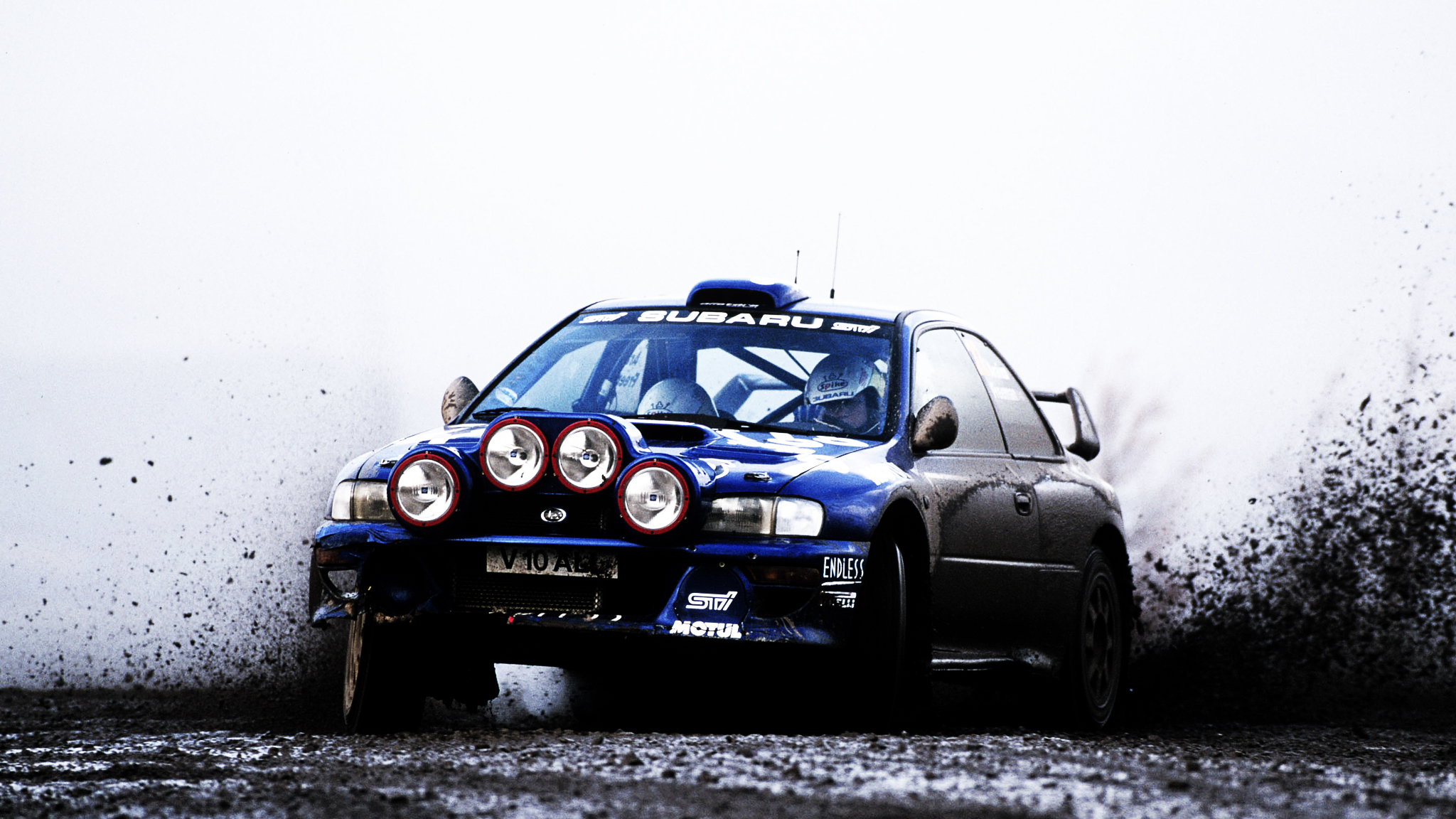 General 2048x1152 car Subaru rally cars Subaru Impreza vehicle race cars racing dirt blue cars sport