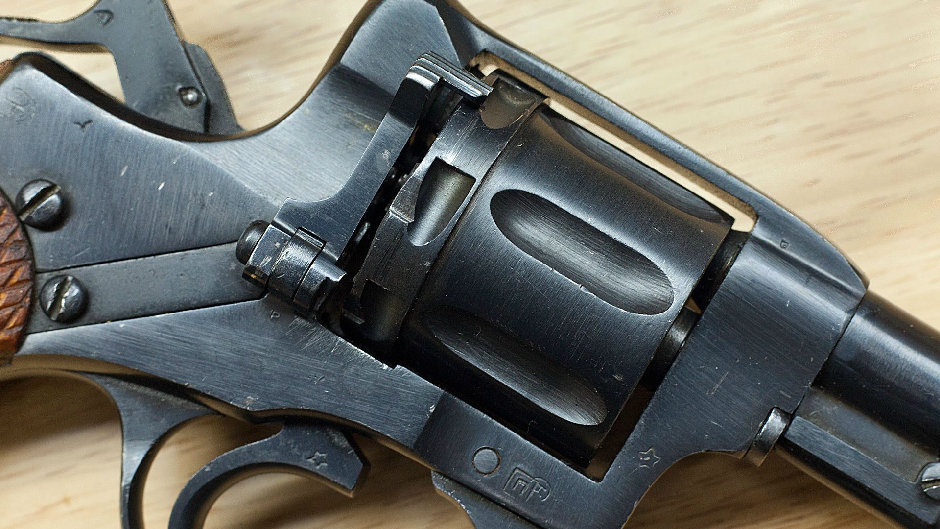 General 1920x1080 gun pistol revolver Nagant M1895 weapon Russian/Soviet firearms closeup wooden surface