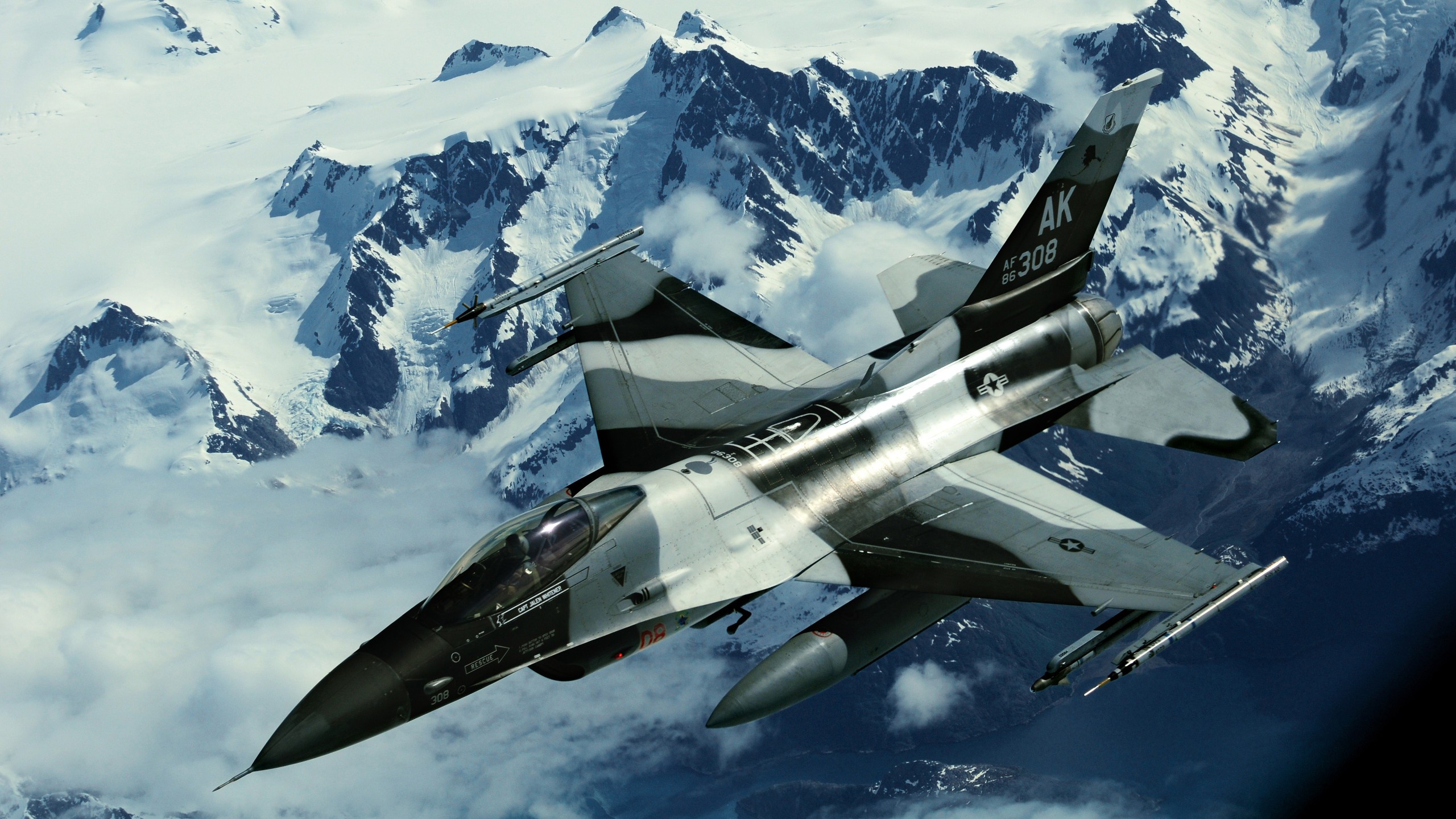 General 2560x1440 General Dynamics F-16 Fighting Falcon Alaska military vehicle aircraft military aircraft numbers US Air Force jet fighter camouflage General Dynamics vehicle military American aircraft snow