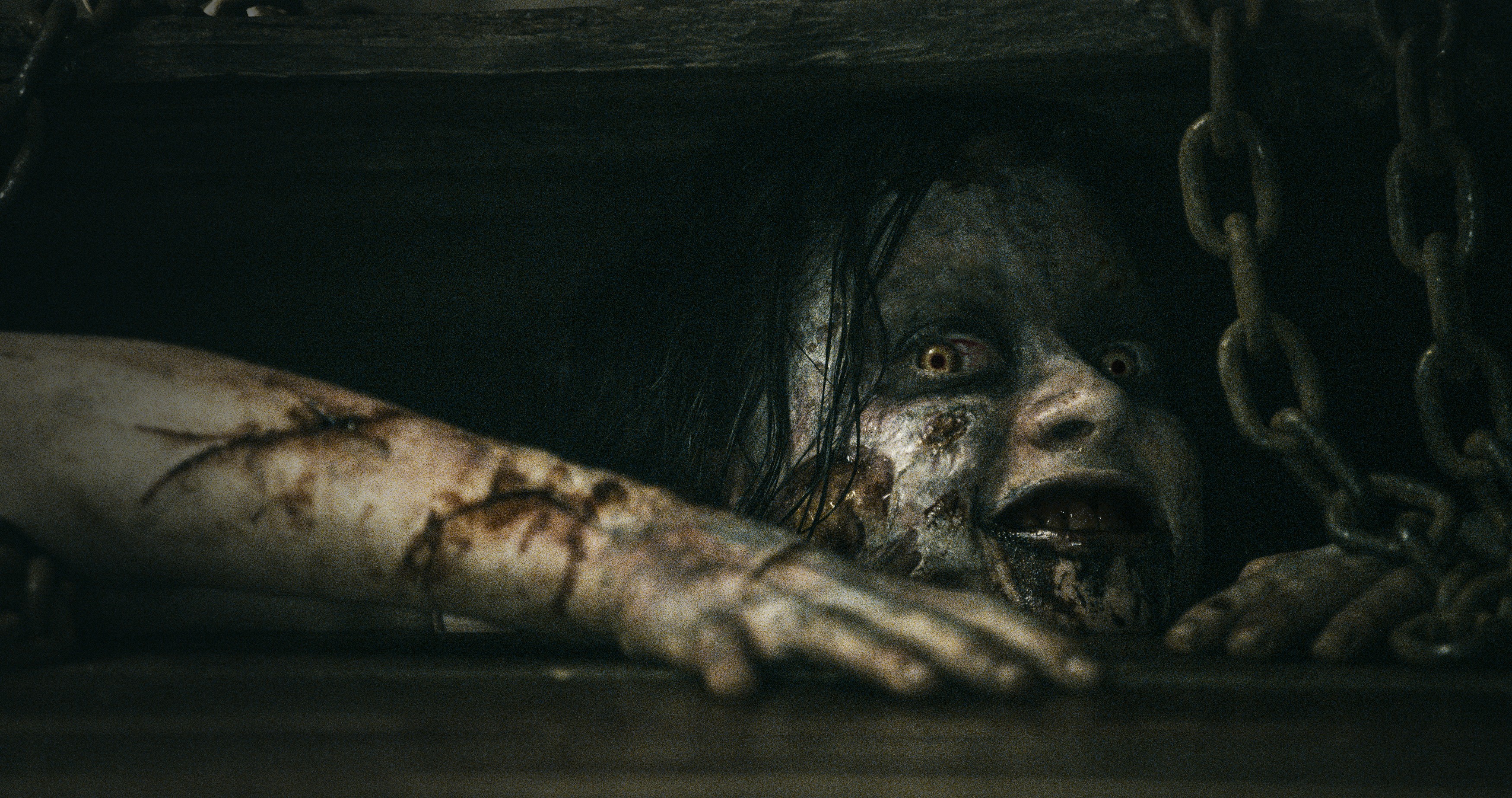 General 3500x1846 horror Evil Dead movies peeking face yellow eyes pale smiling dark chains scary face looking at viewer blood demon girls demon film stills