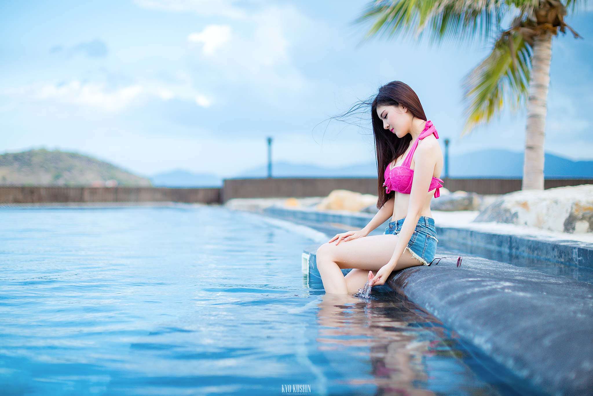 People 2048x1366 women Asian sitting jean shorts swimming pool outdoors women outdoors bra pink bra in water water makeup pink lipstick model long hair Kyo Kushin