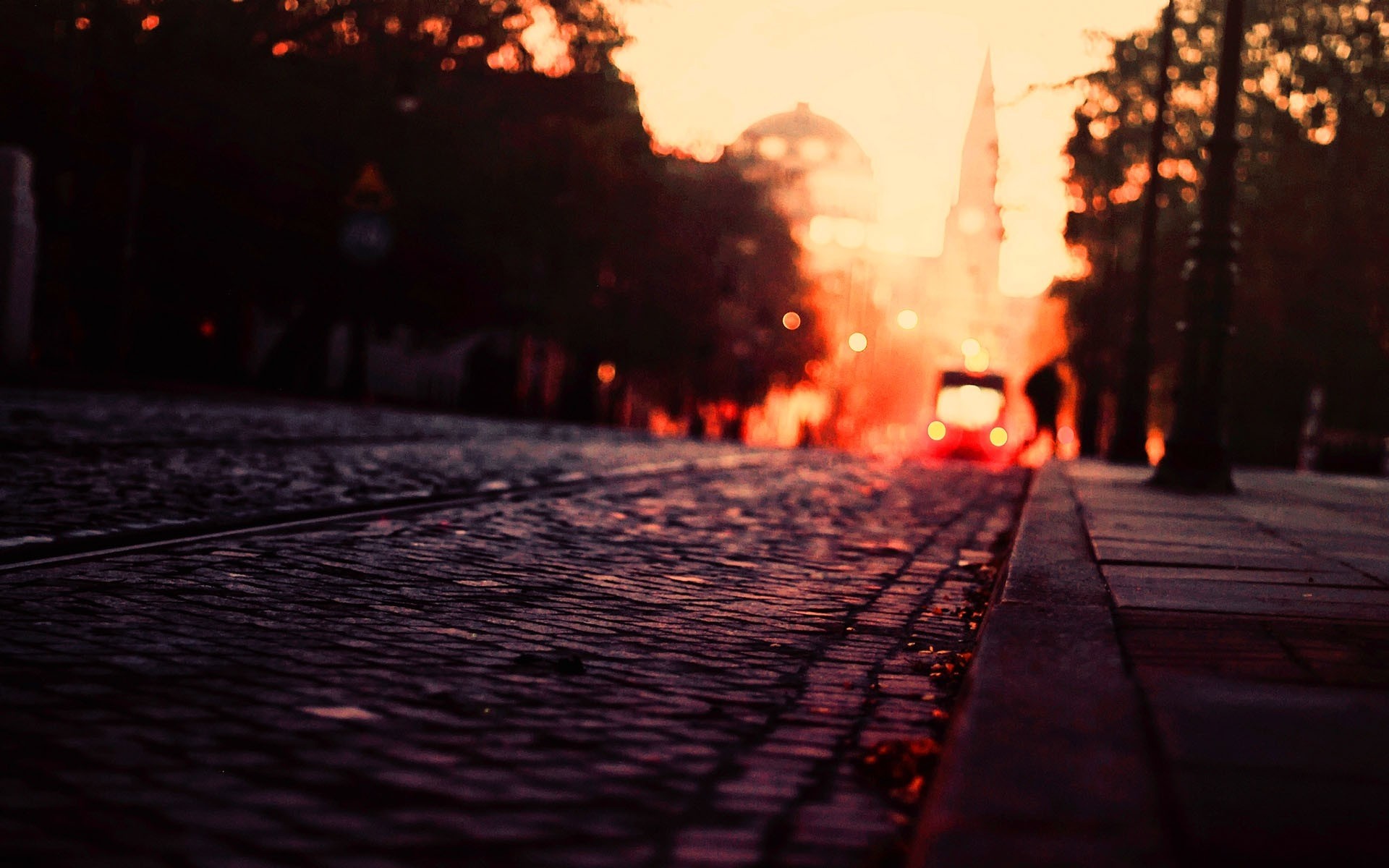 General 1920x1200 photography urban city warm colors fall road tram cobblestone street pavements worm's eye view low light