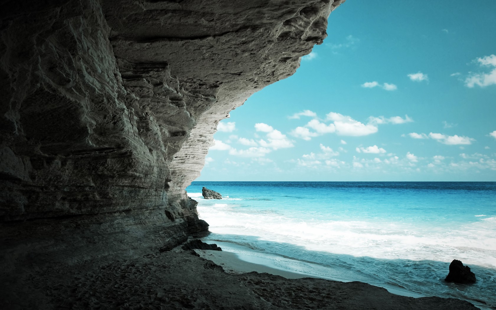 General 1680x1050 beach sand coast sea nature cave sky horizon rocks