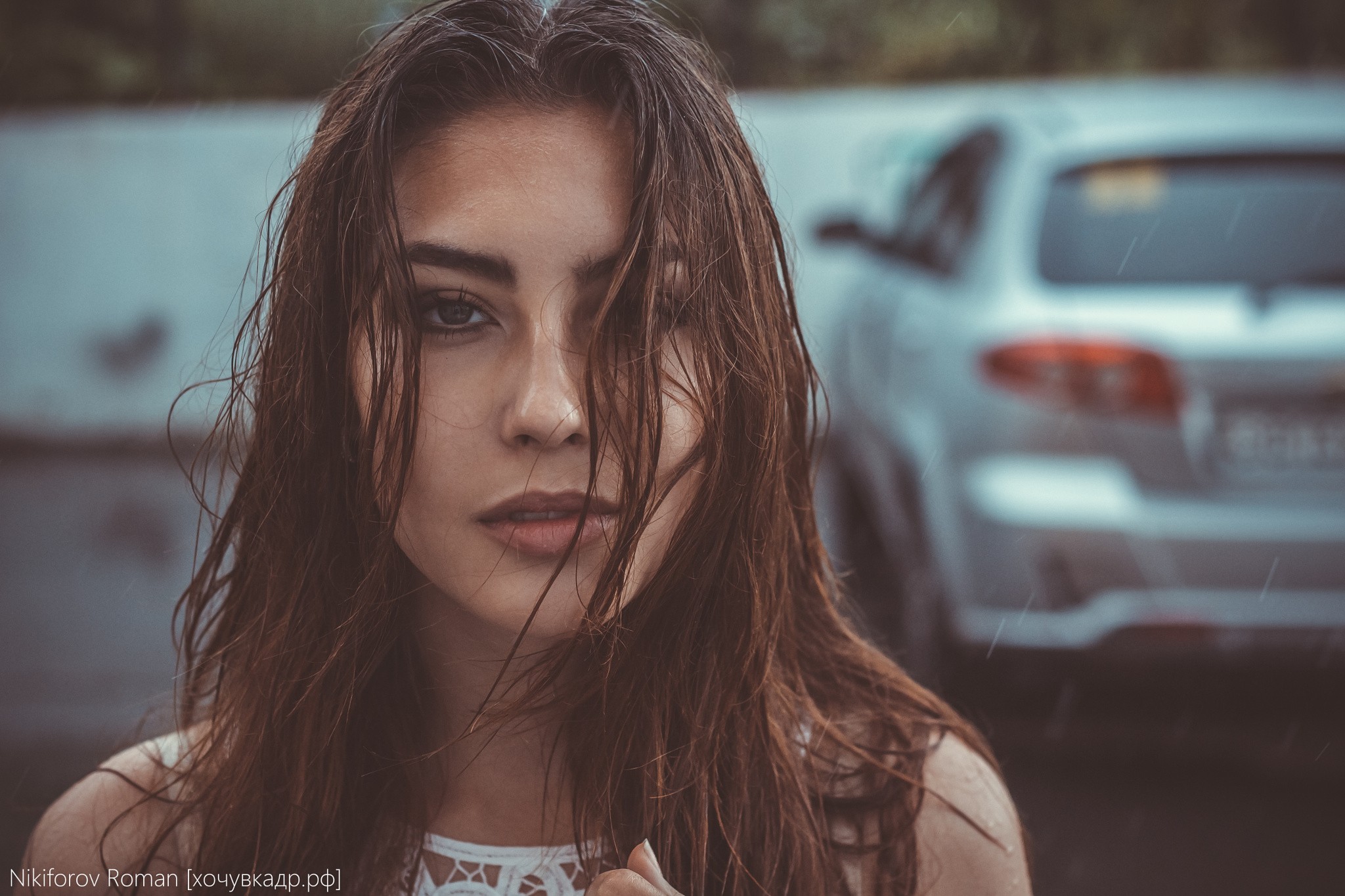 People 2048x1365 women model brunette wet hair rain portrait hair in face women outdoors makeup looking at viewer long hair car Roman Nikiforov