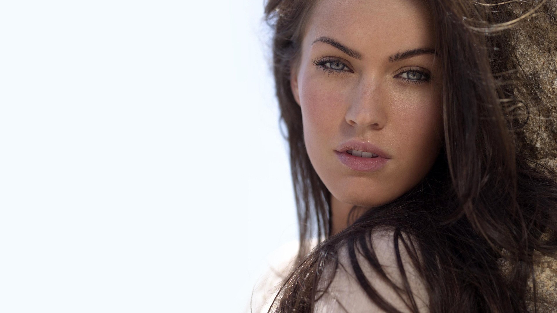 People 1920x1080 Megan Fox women brunette face actress celebrity looking at viewer simple background