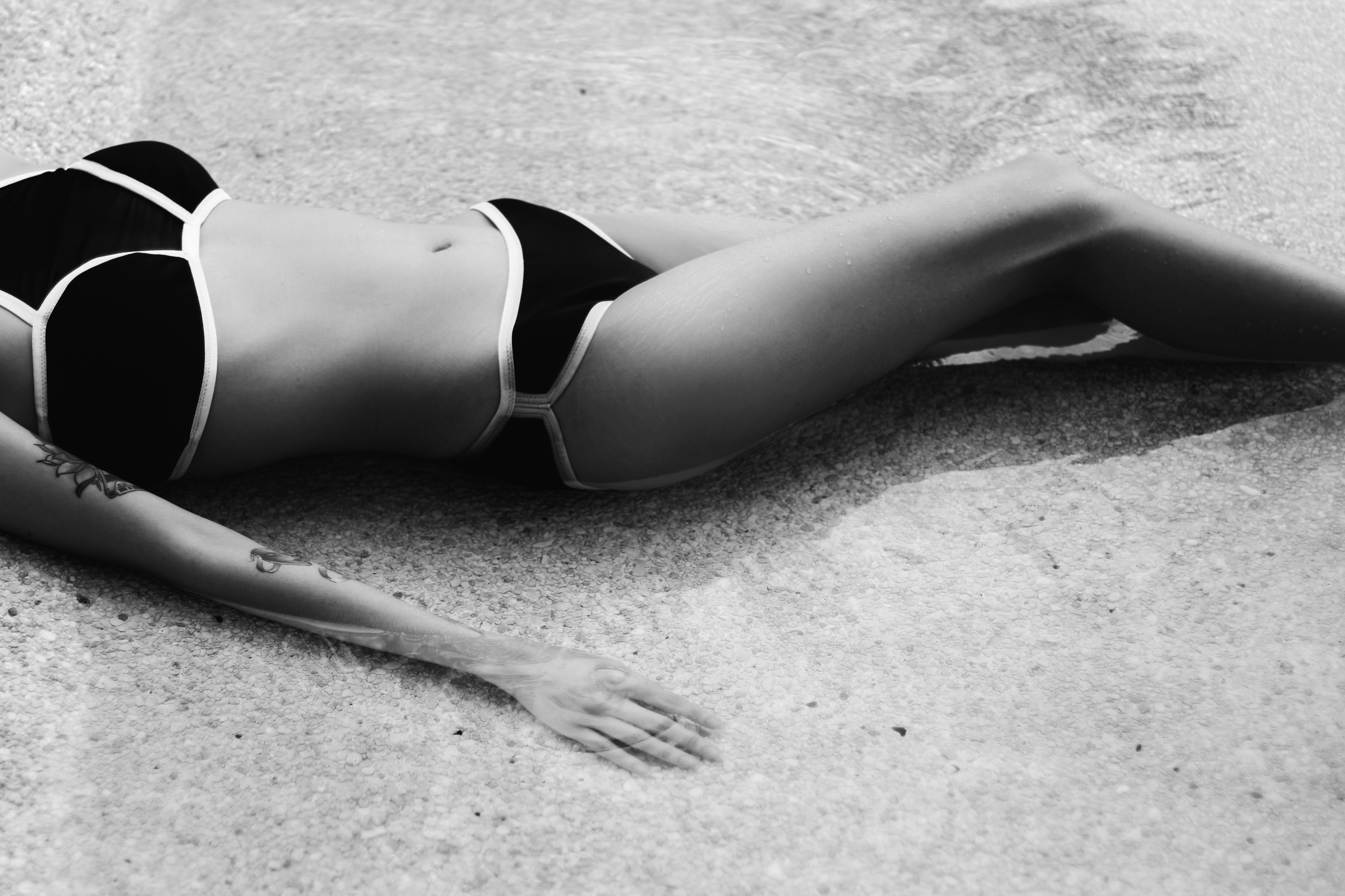 People 3532x2354 women monochrome women on beach black bikinis in water wet body bikini belly swimwear inked girls women outdoors lying on back