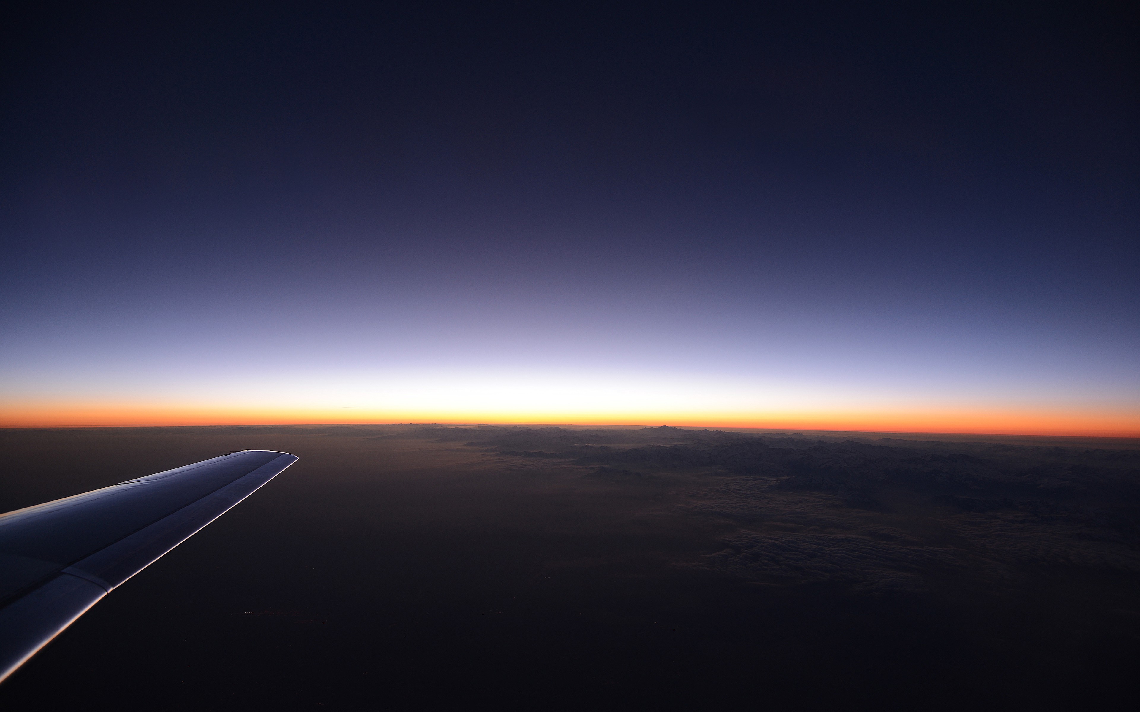 General 3840x2400 landscape horizon sunrise sky airplane wing aircraft sunlight dark