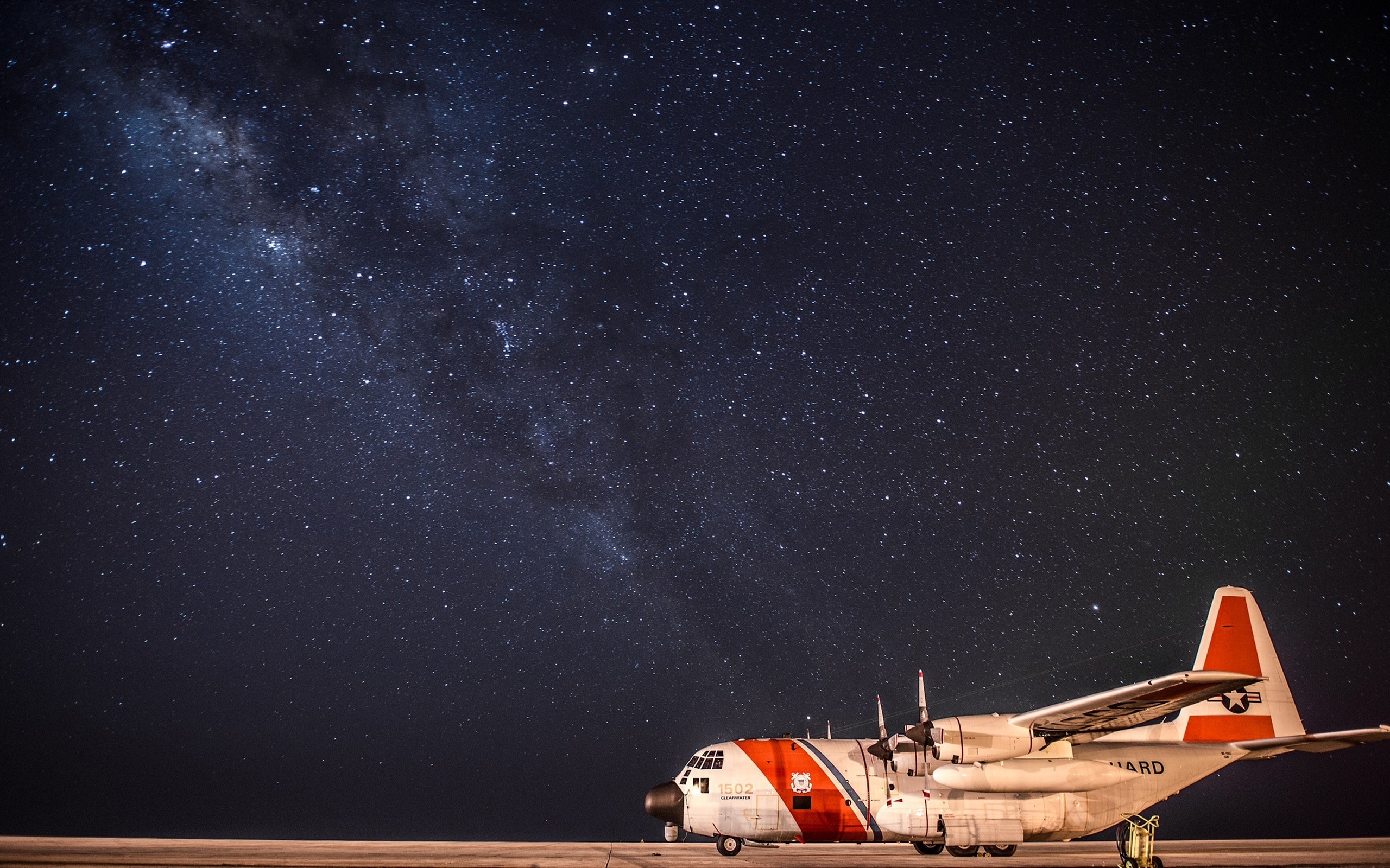General 2560x1600 Milky Way space coast guard Lockheed C-130 Hercules sky vehicle aircraft United States Coast Guard starry night