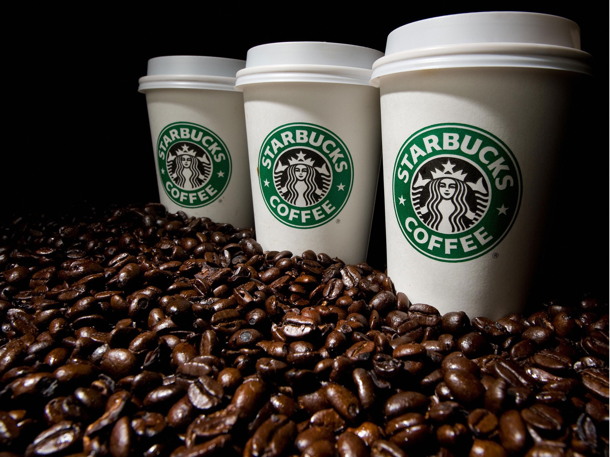 General 2048x1536 Starbucks coffee coffee beans advertisements cup brand food black background logo