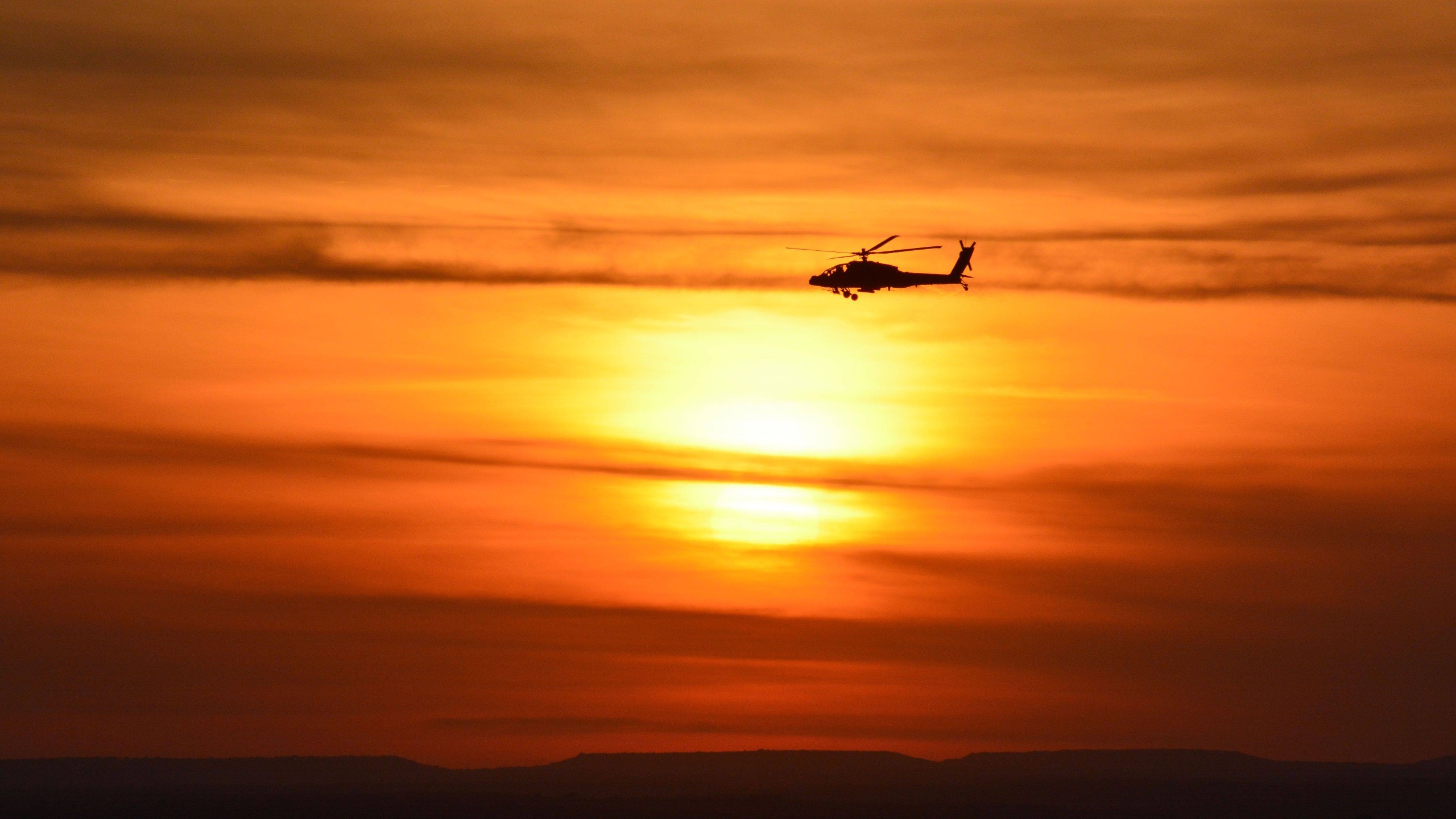 General 2560x1440 military aircraft military aircraft helicopters sunset Boeing AH-64 Apache orange sky sunlight military vehicle vehicle