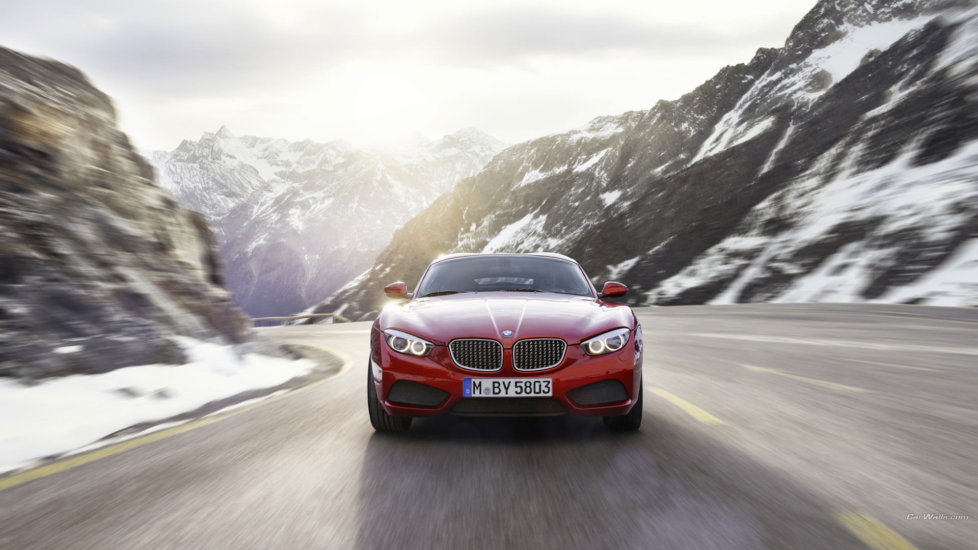 General 1920x1080 car BMW red cars coupe BMW Z4 Zagato vehicle asphalt mountains German cars frontal view licence plates road snow sunlight snow covered motion blur headlights watermarked