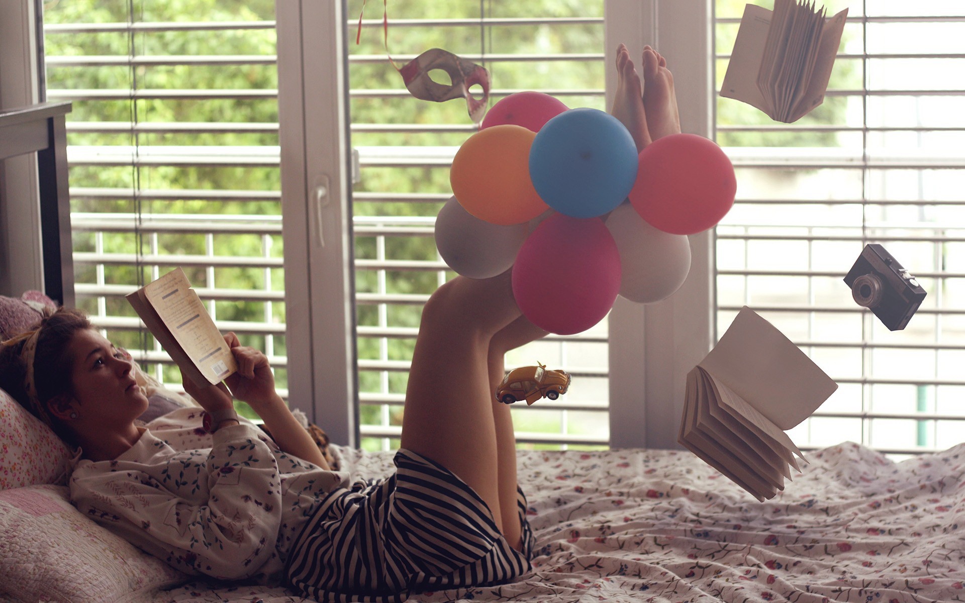 People 1920x1200 women balloon floating reading bed window books barefoot camera striped clothing venetian masks toys car legs up