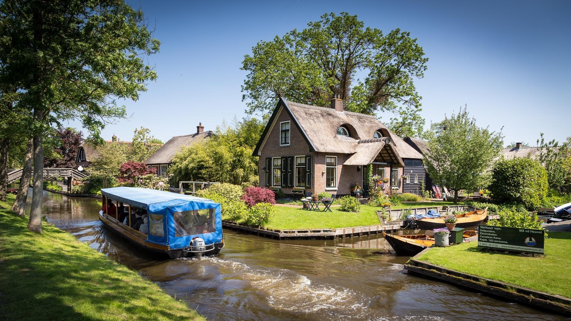 General 1920x1080 architecture house Netherlands water trees garden grass village boat Tourism people flowers canal summer