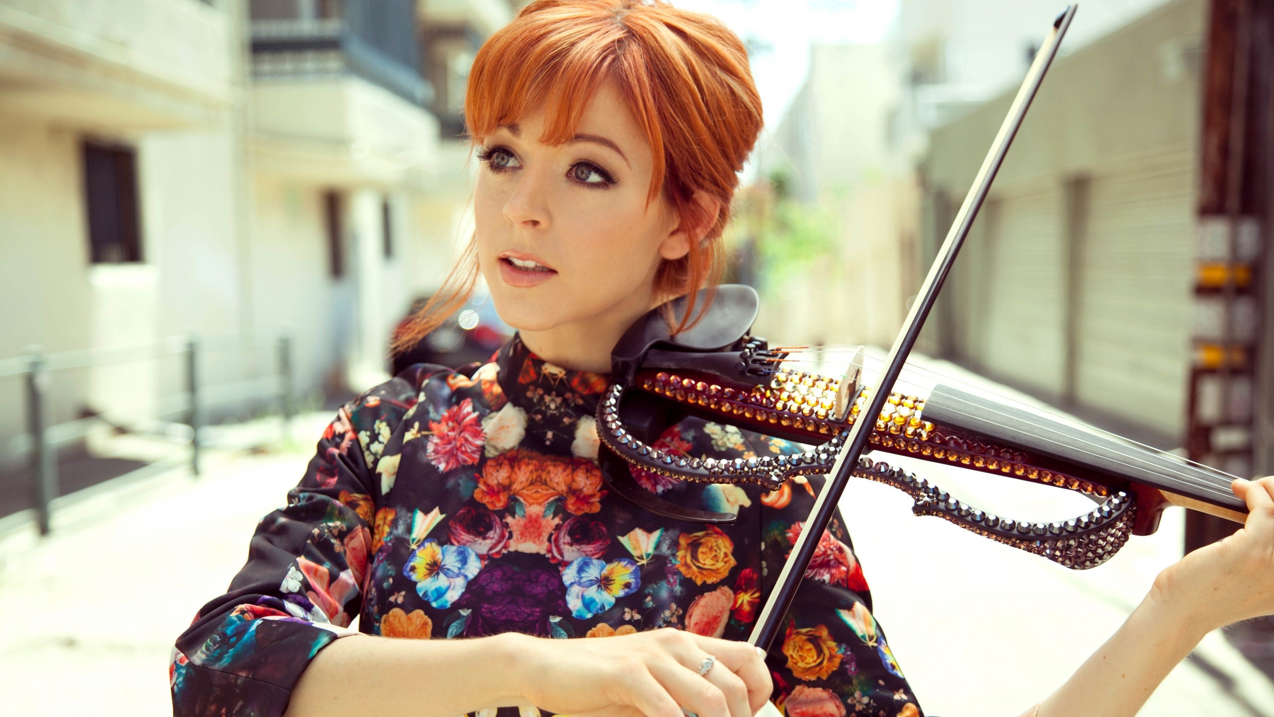 People 2560x1440 women redhead face women outdoors Lindsey Stirling short hair violin open mouth playing street dress blue eyes musician public street view musical instrument looking away model