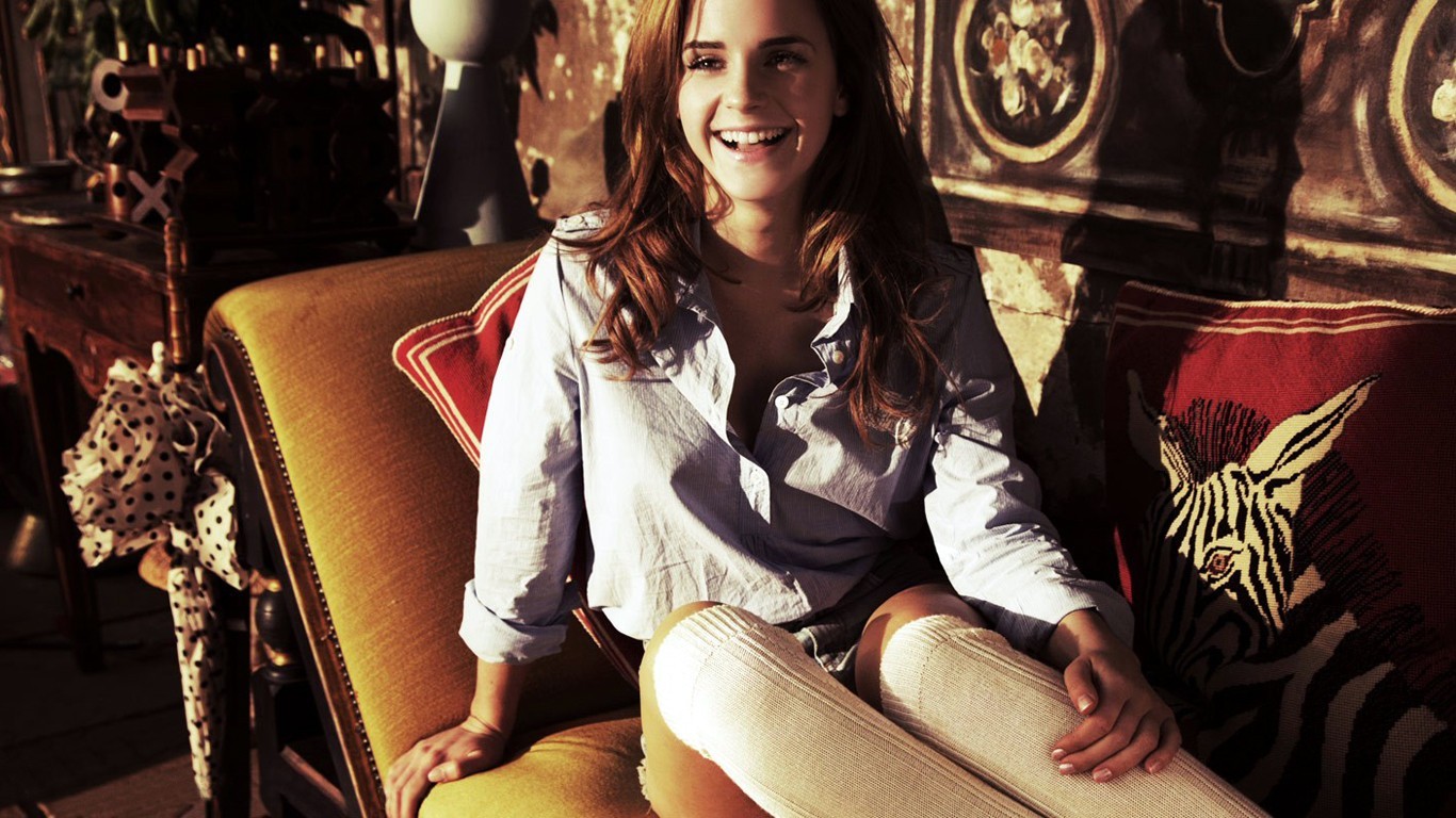 People 1366x768 Emma Watson smiling actress women long hair couch socks celebrity women indoors open mouth indoors British women