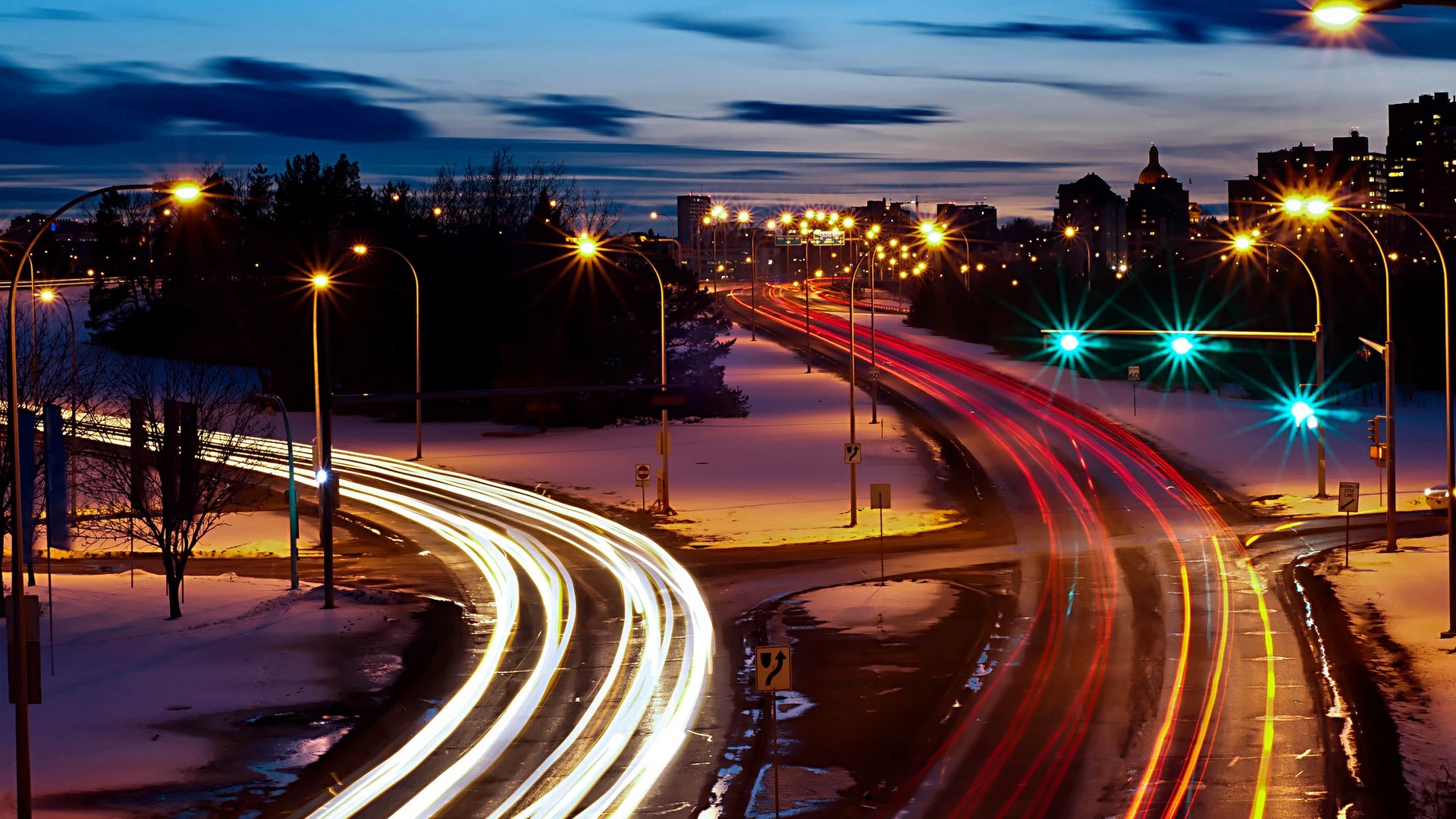 General 1920x1080 cityscape long exposure road light trails street light Canada city lights evening snow road sign