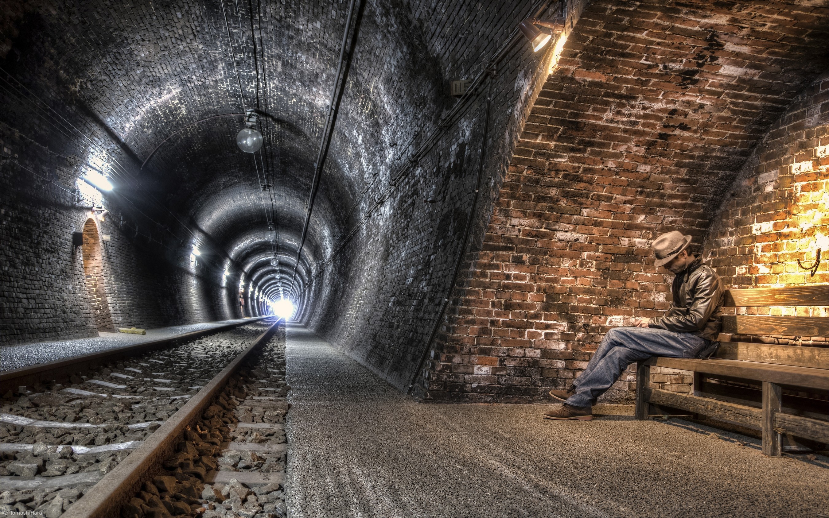General 2700x1688 lights men bench wall writing beige tunnel underground hat railway