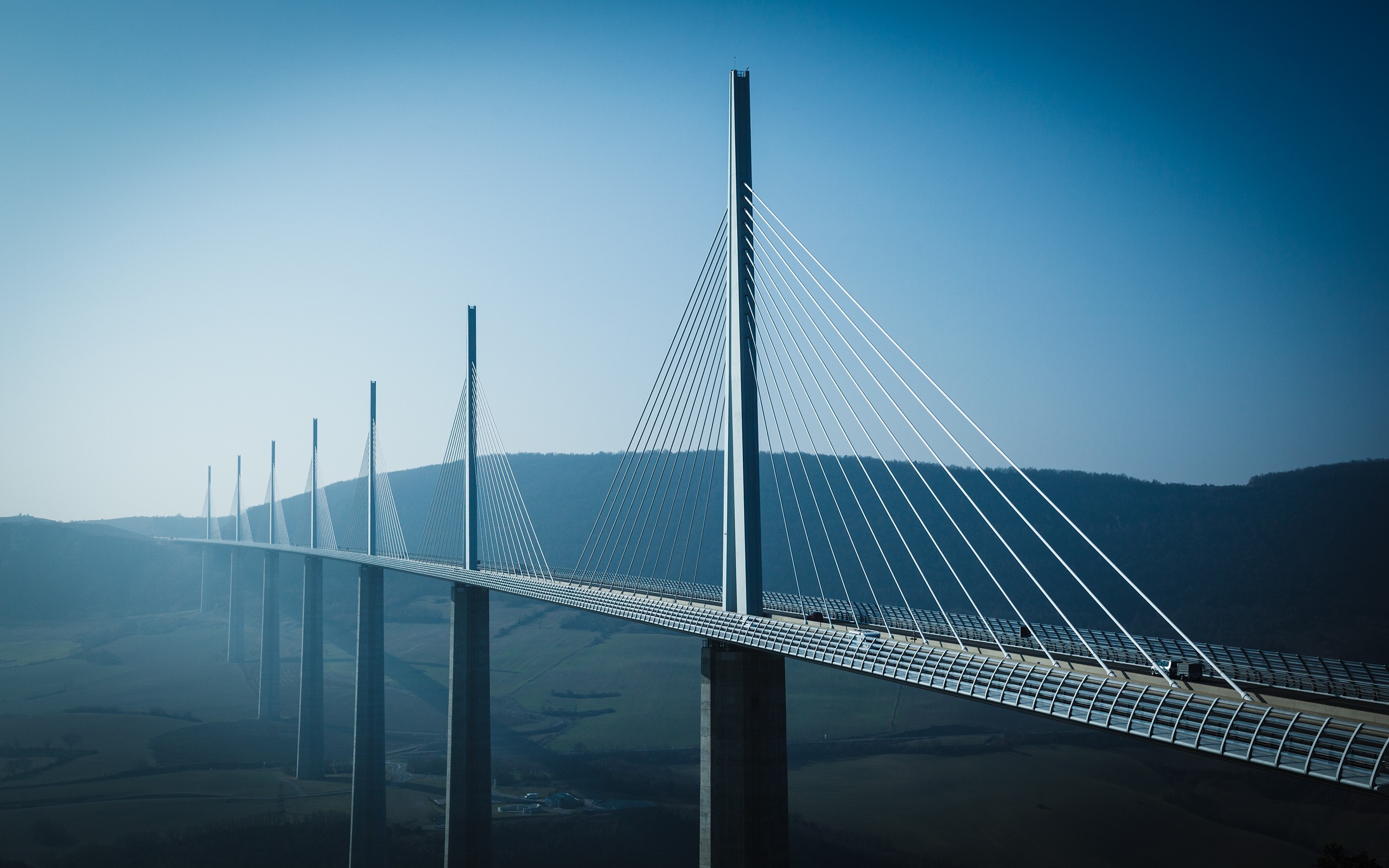 General 2560x1600 bridge landscape valley Millau Viaduct France architecture sky construction suspension bridge
