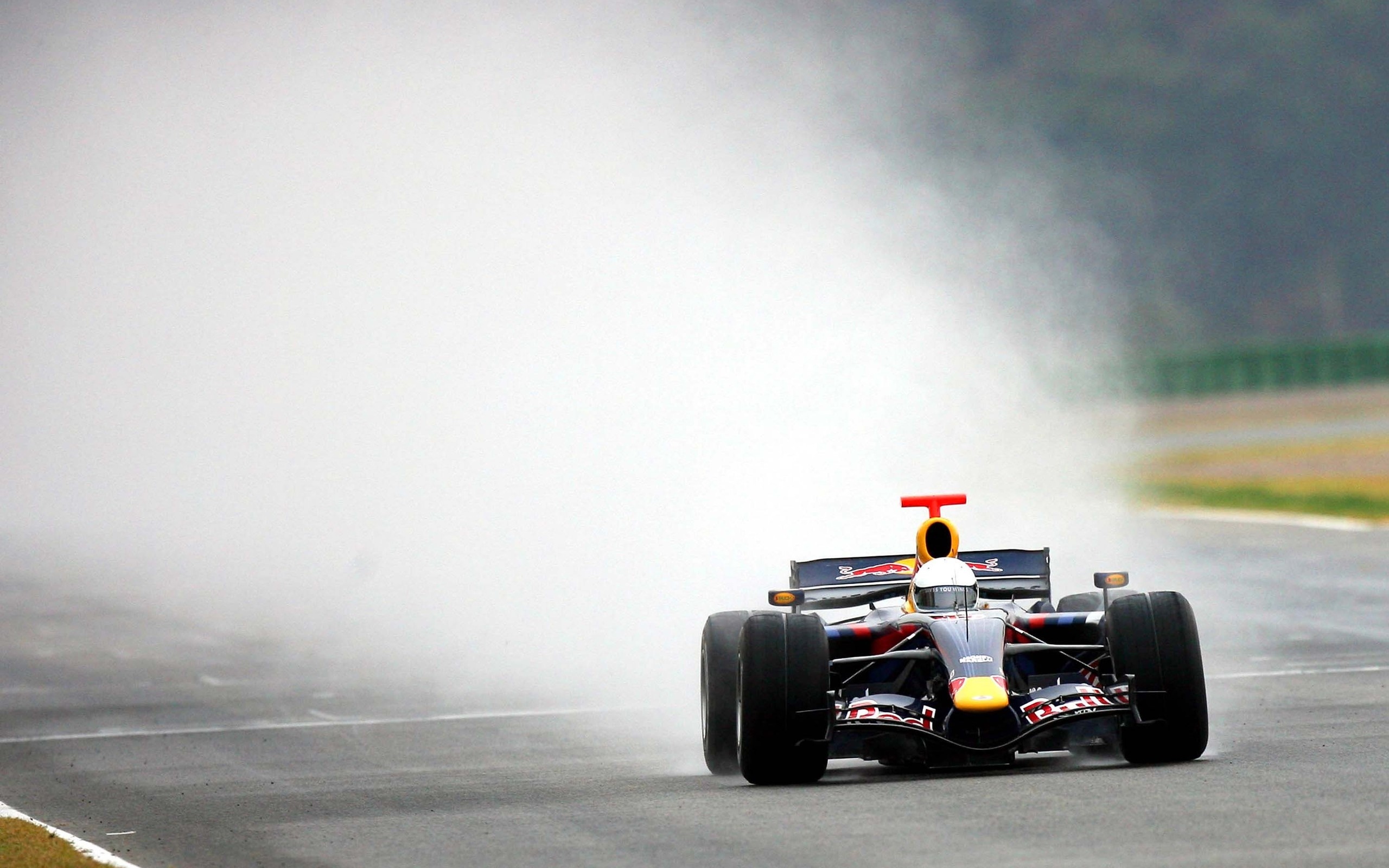 General 2560x1600 car Formula 1 race tracks Red Bull Racing race cars sport smoke helmet vehicle motorsport
