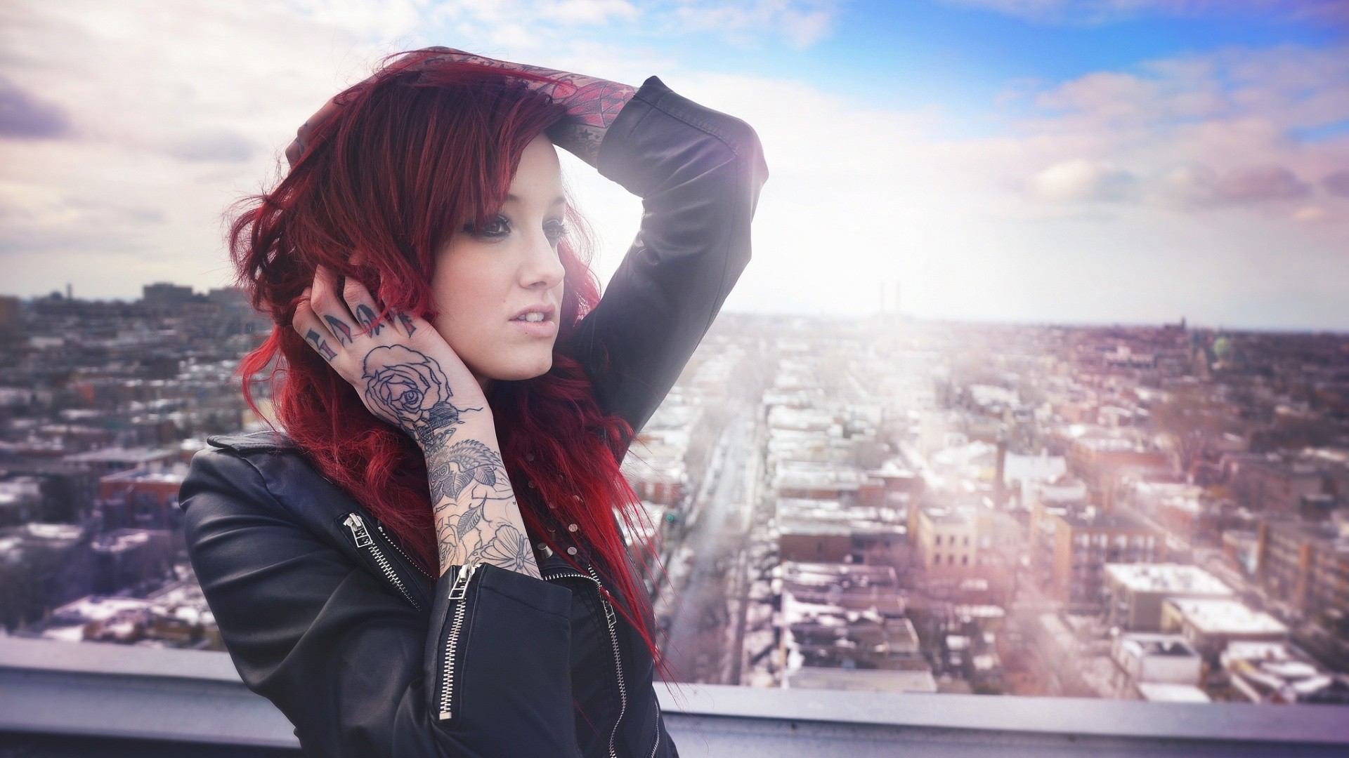 People 1920x1080 tattoo women women outdoors depth of field inked girls long hair leather jacket hands in hair urban cityscape looking into the distance dyed hair redhead arms up
