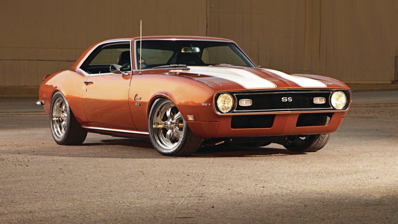 General 1366x768 car Chevrolet Camaro SS vehicle orange cars Chevrolet Camaro Chevrolet racing stripes muscle cars American cars