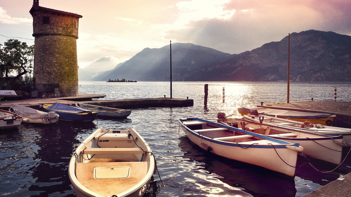 General 1366x768 water lake nature dock mountains boat pier tower sun rays outdoors vehicle landscape