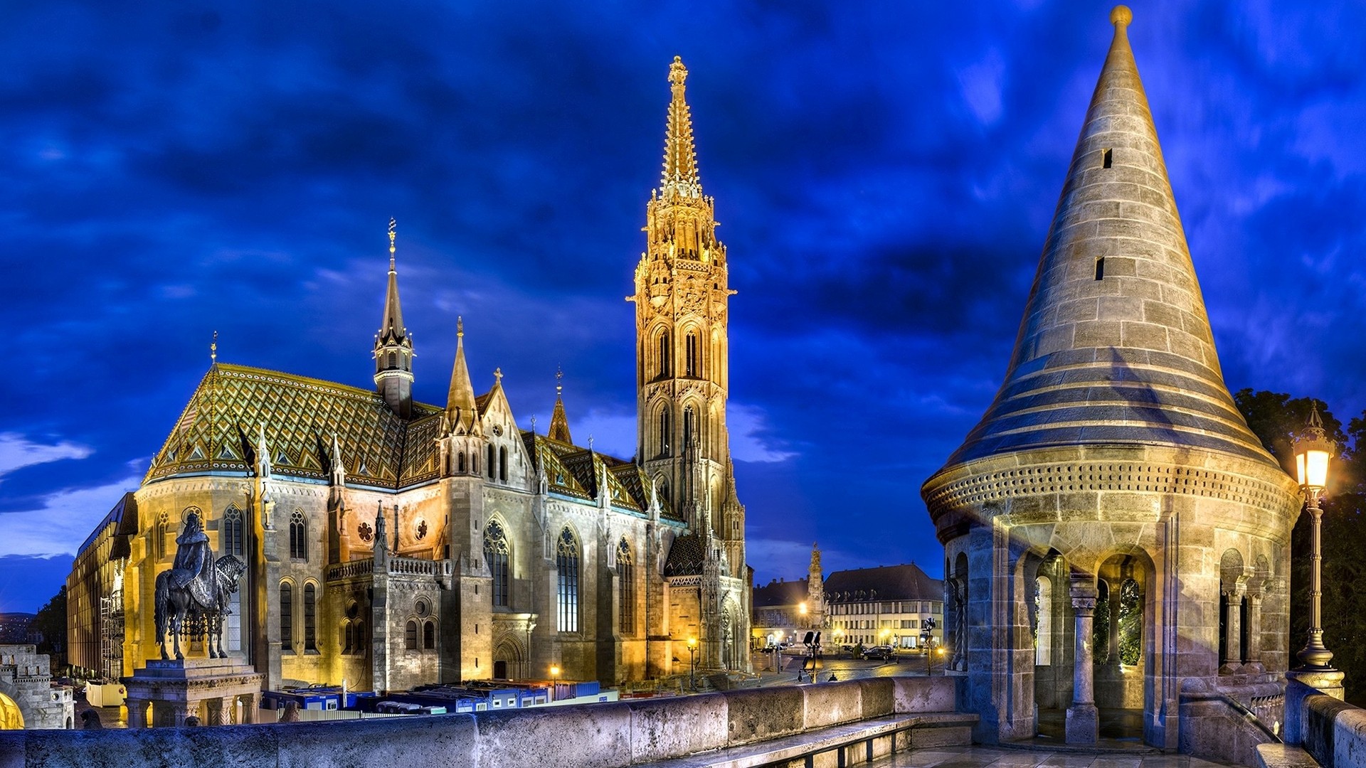 General 1920x1080 cityscape architecture building city night lights Budapest Hungary cathedral tower ancient history statue old building town square bricks trees clouds evening church horse king HDR