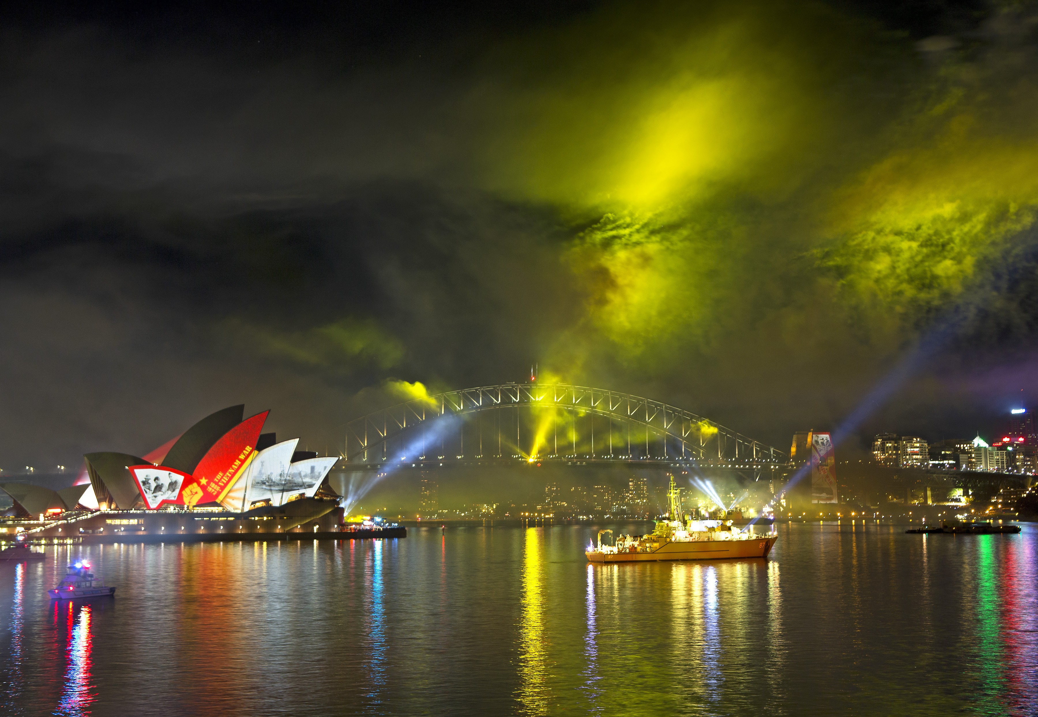 General 3600x2486 Australia Sydney Sydney Opera House bridge landmark Oceania colorful water sky night boat city building clouds lights