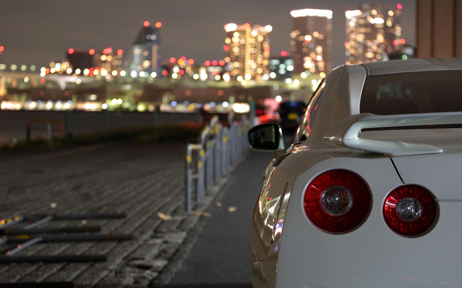 General 1920x1200 city lights bokeh white cars car depth of field Nissan Nissan GT-R taillights vehicle