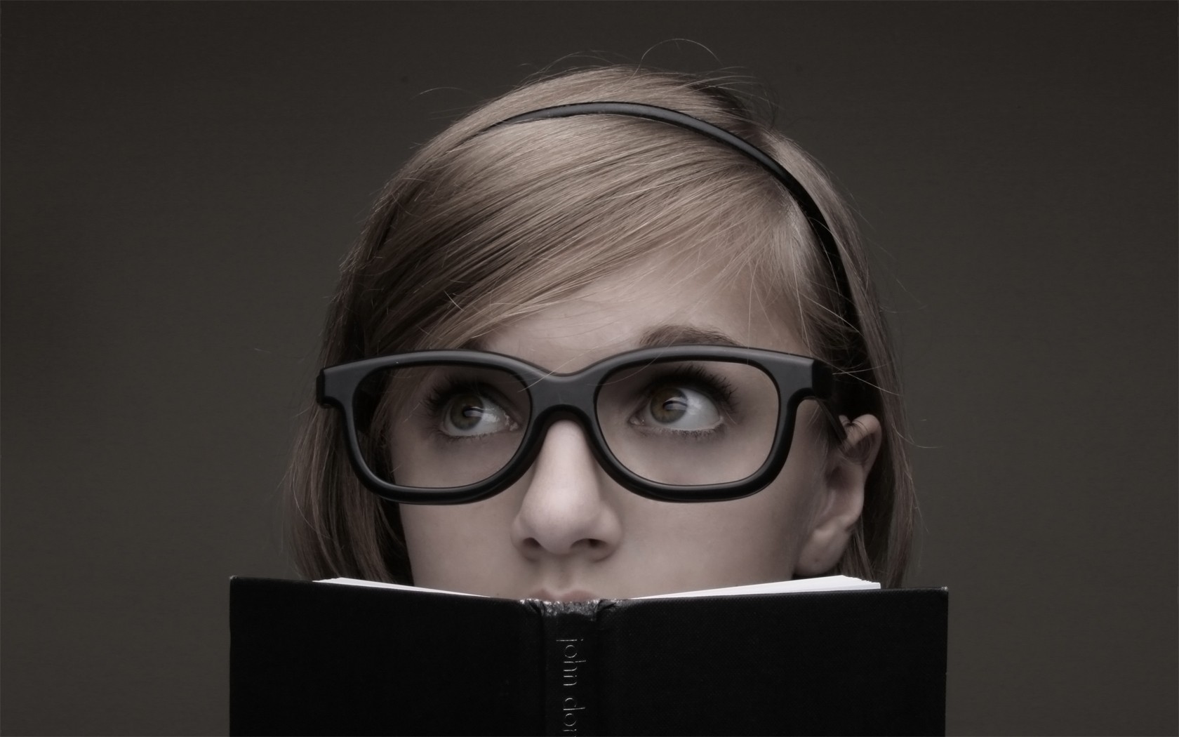 People 1680x1050 glasses books women with glasses looking up women women indoors indoors simple background